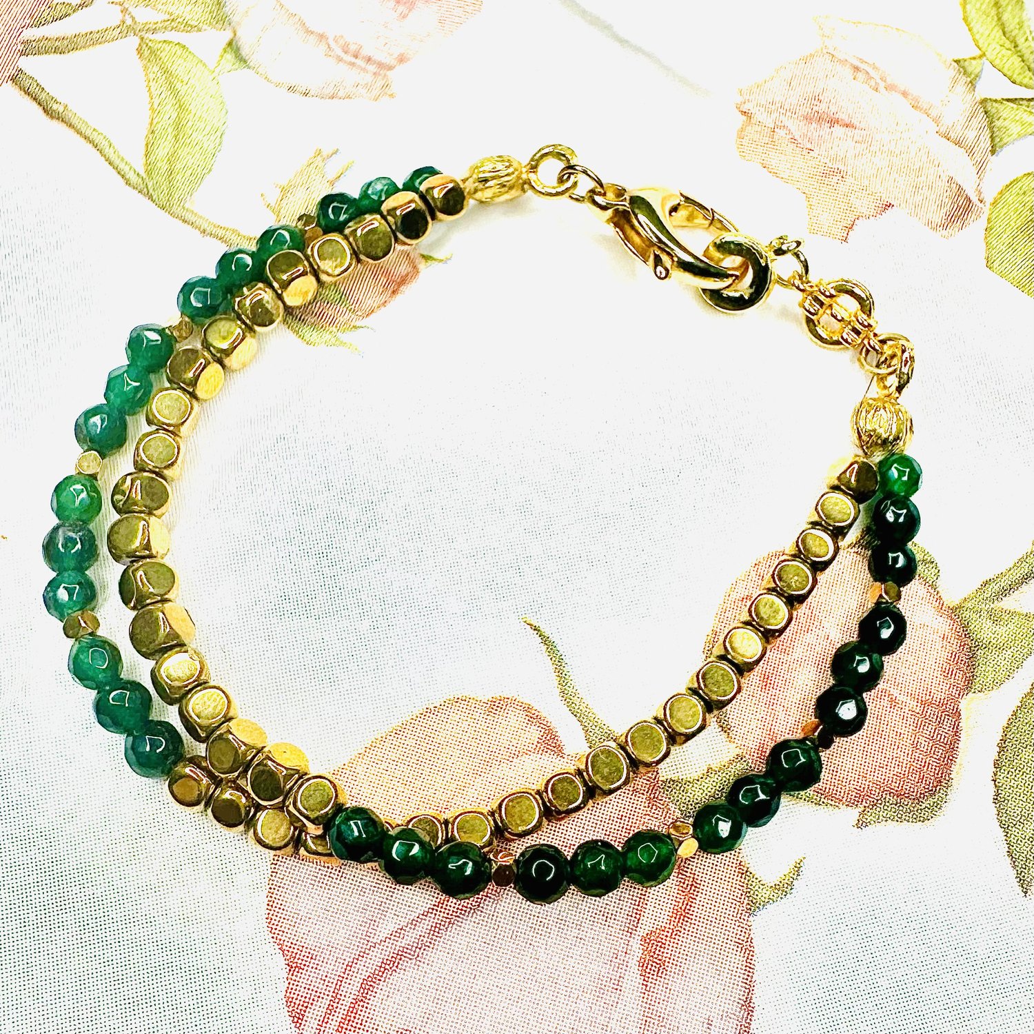 Petra Bracelet with Green Agate, featuring rich green gemstone beads and gold-plated haematite accents.