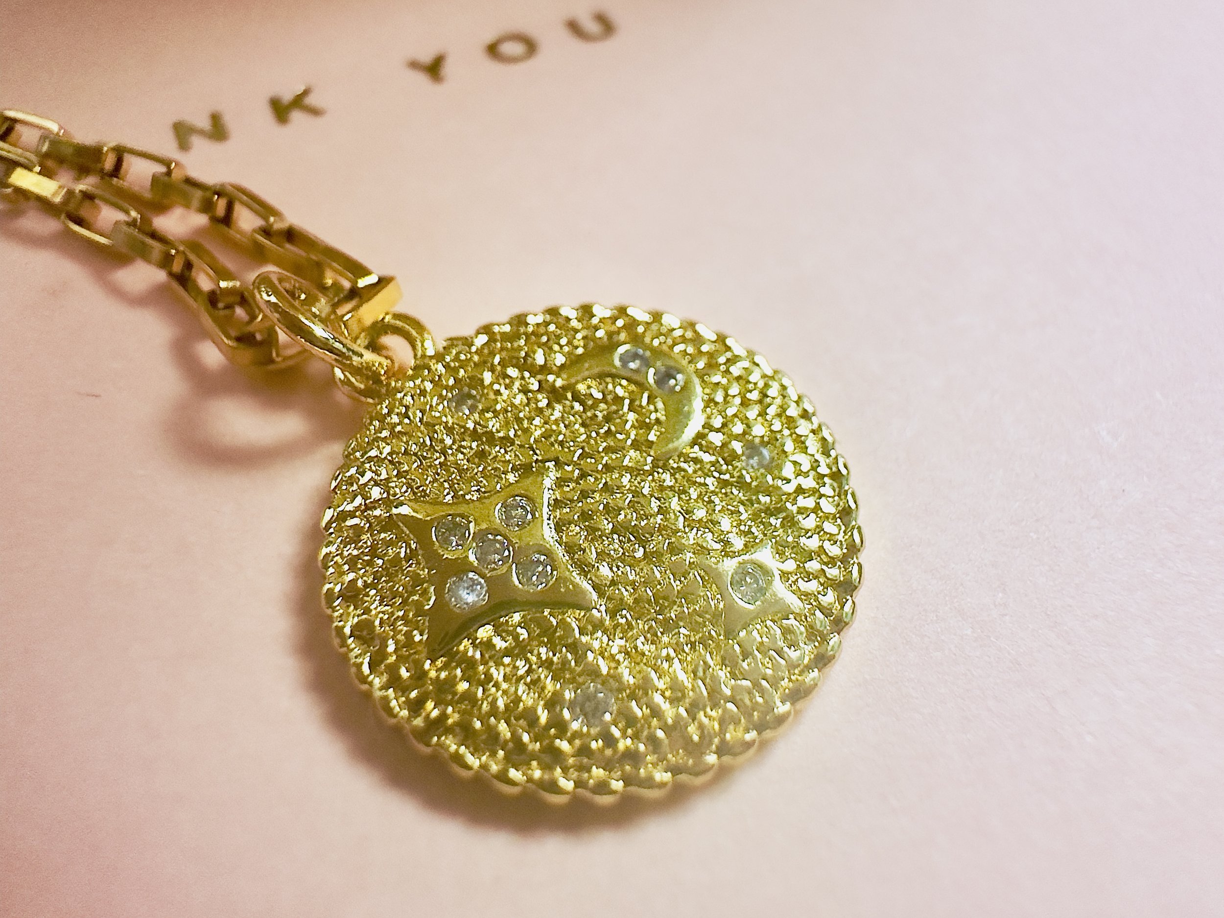 Catch the moon, spot the stars — it's all possible with the ethereally beautiful Clair de Lune necklace.
