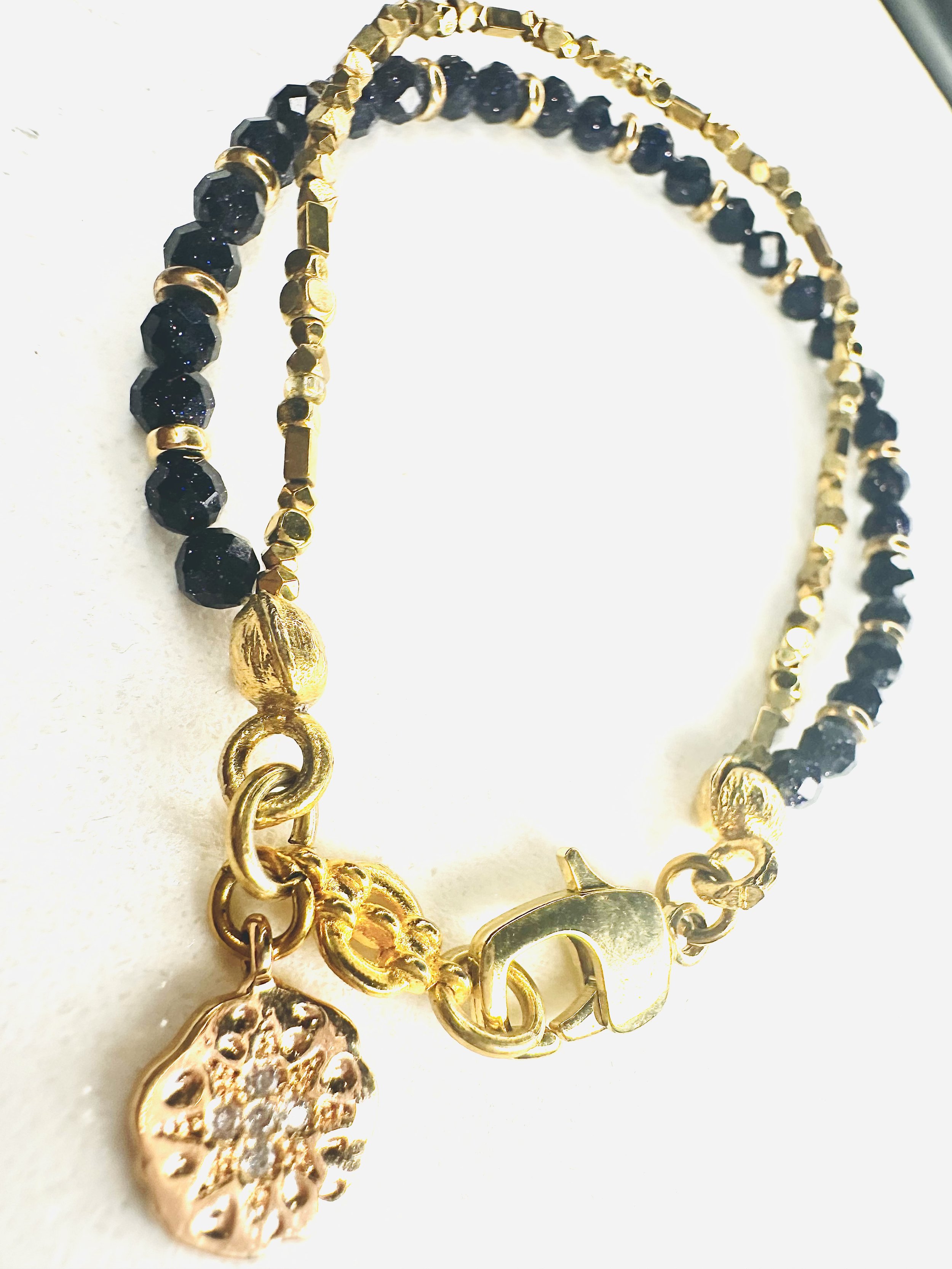 Minimalist design meets spiritual depth in this Ariadne bracelet