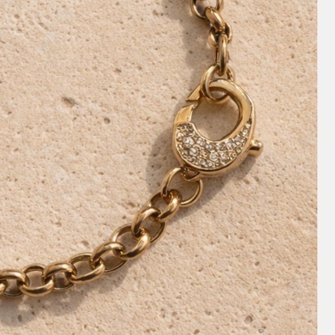 Close-up of cubic zirconia clasp with polished finish