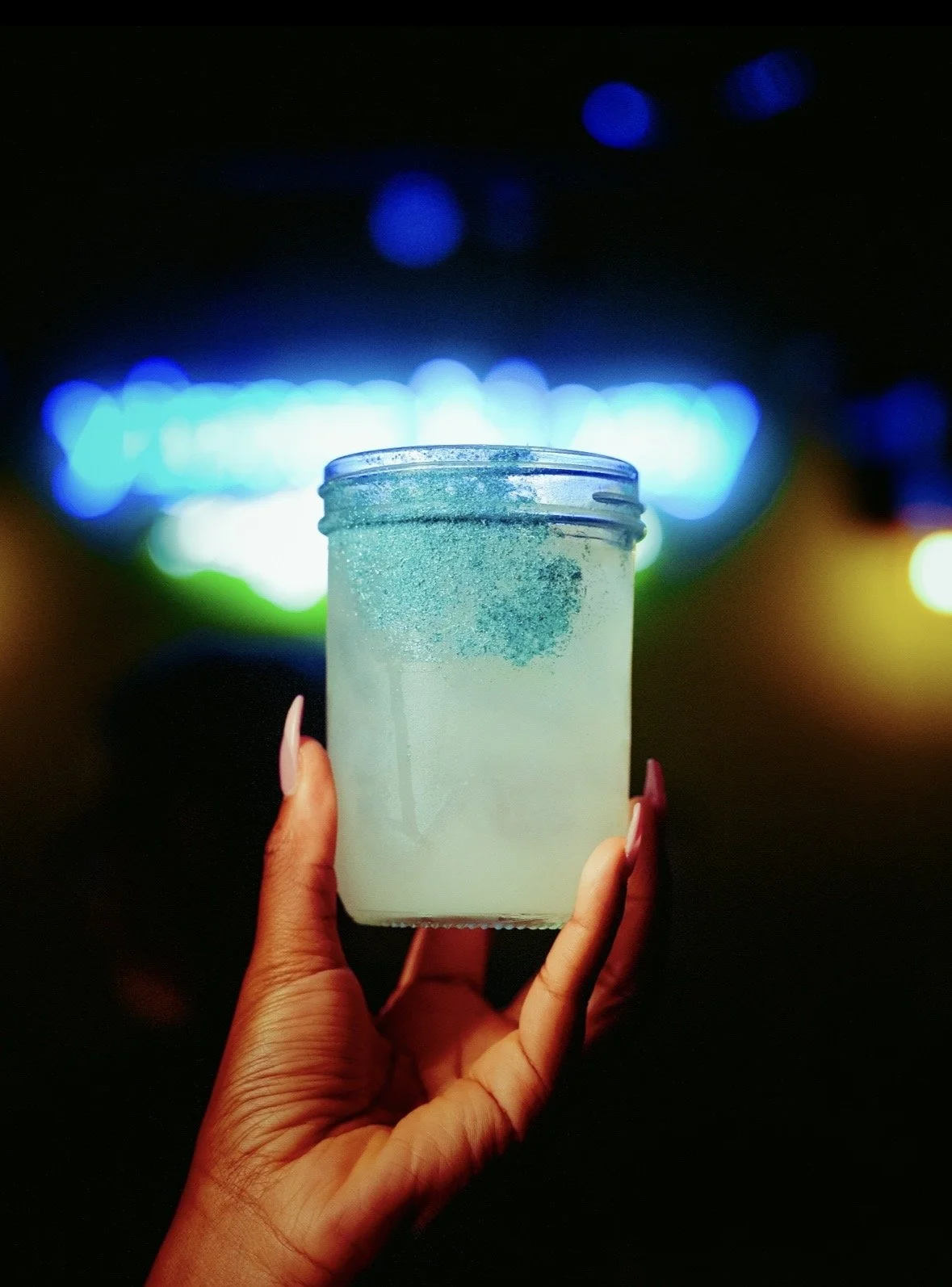 The Chandelier cocktail at Chartreuse Saloon featuring Electric Dust!