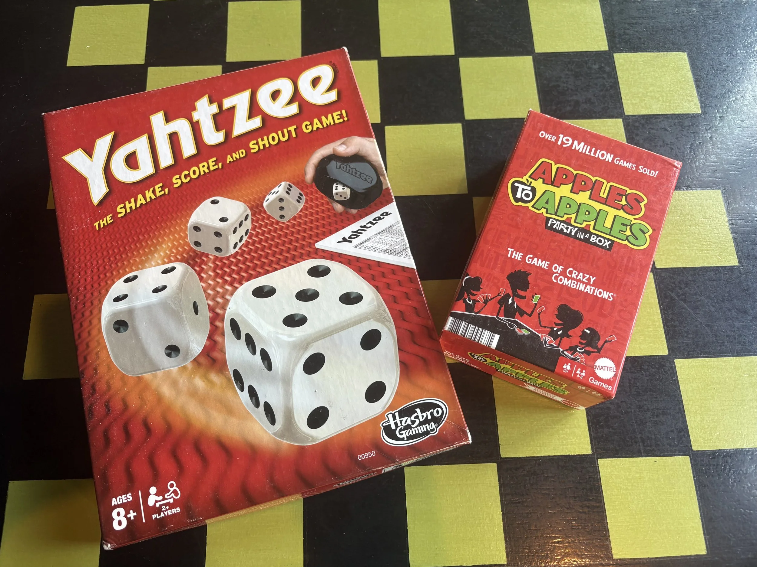 Board games at Chartreuse Saloon, a popular, local bar in the Crossroads of Kansas City that is perfect for date night, or hanging with friends.