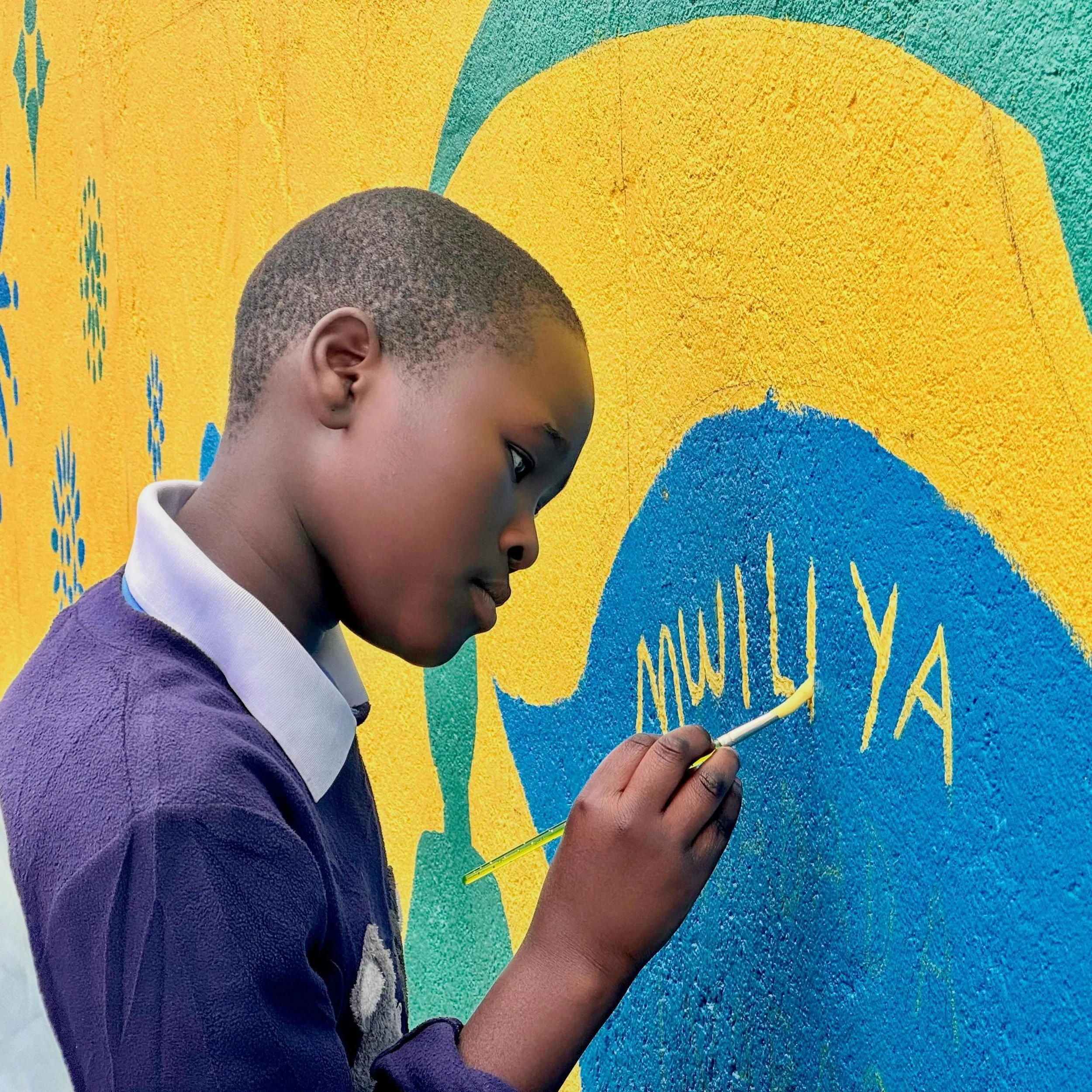 In March, Colors of Connection began the creation of a large scale mural in the neighborhood where our girls and mentors live. Our process of brainstorming, planning, and painting the mural is intentionally designed to integrate the messaging and ima