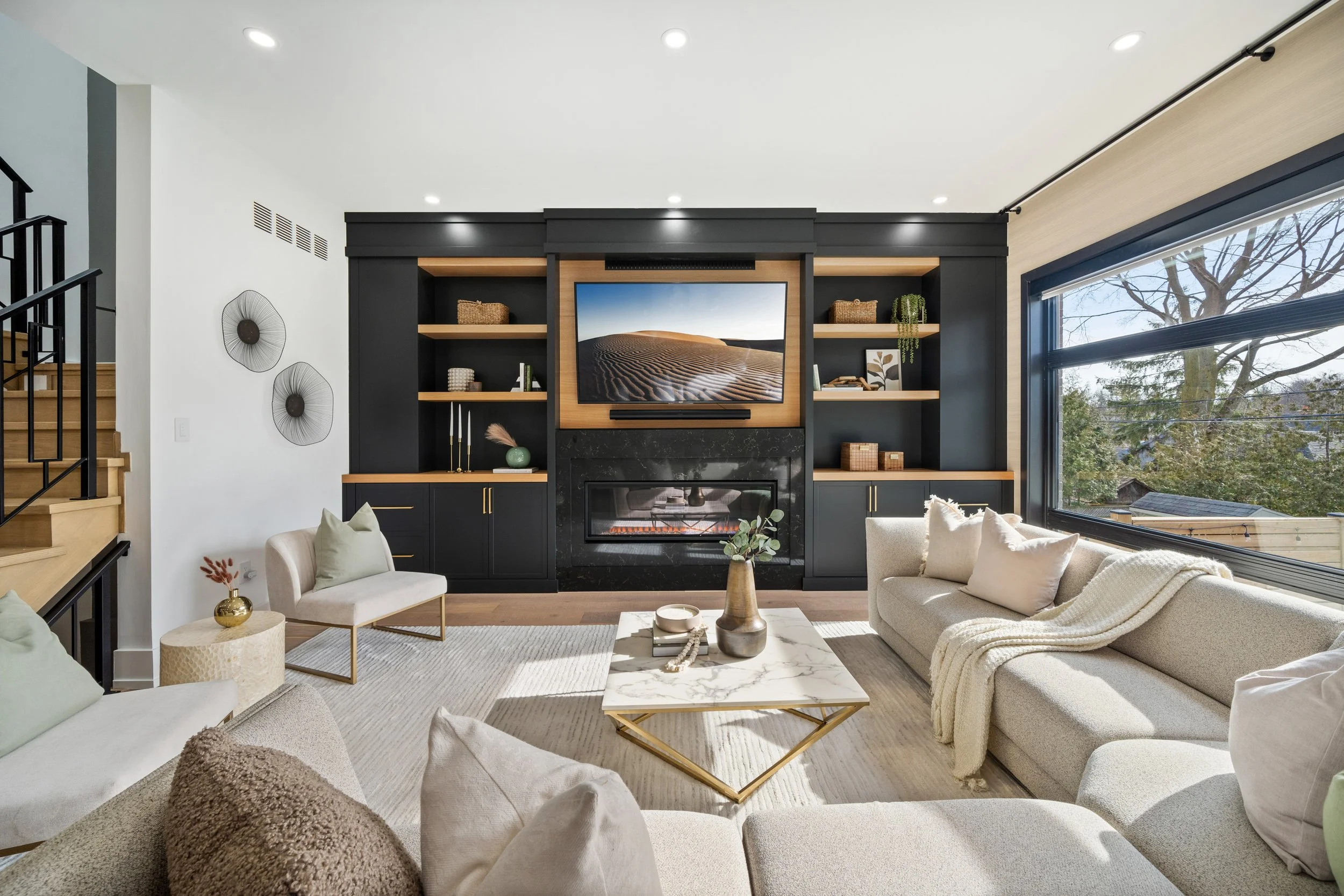 Upscale modern living room interior with beige couches and marble accents
