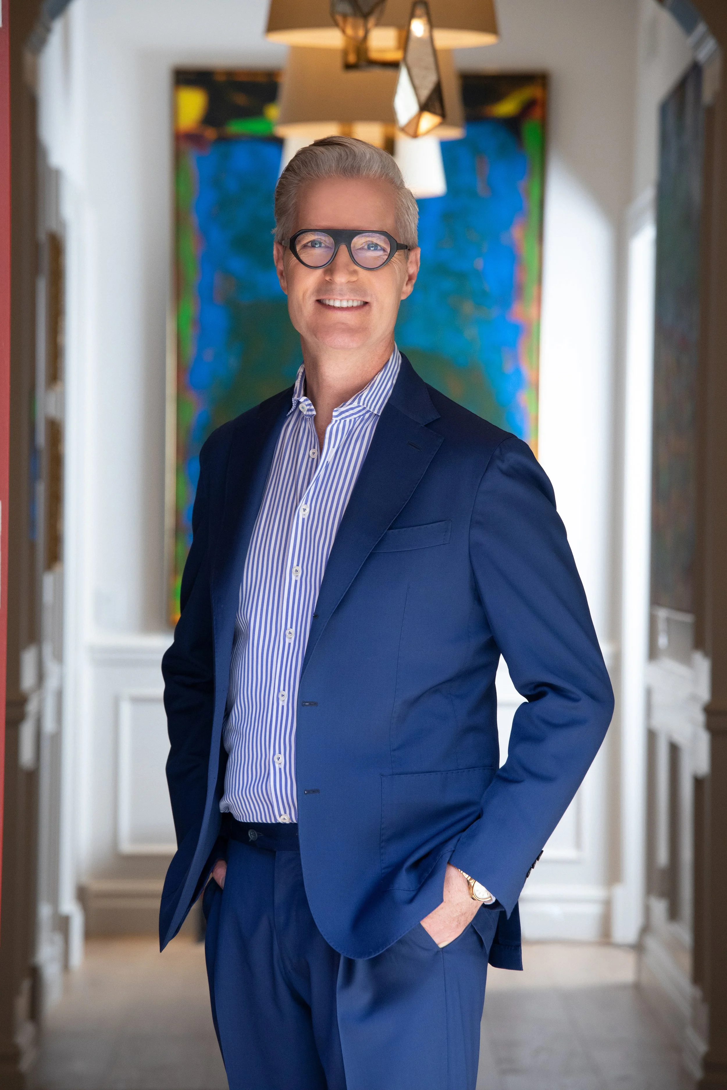 Paul Maranger Headshot standing in hallway of a luxury home