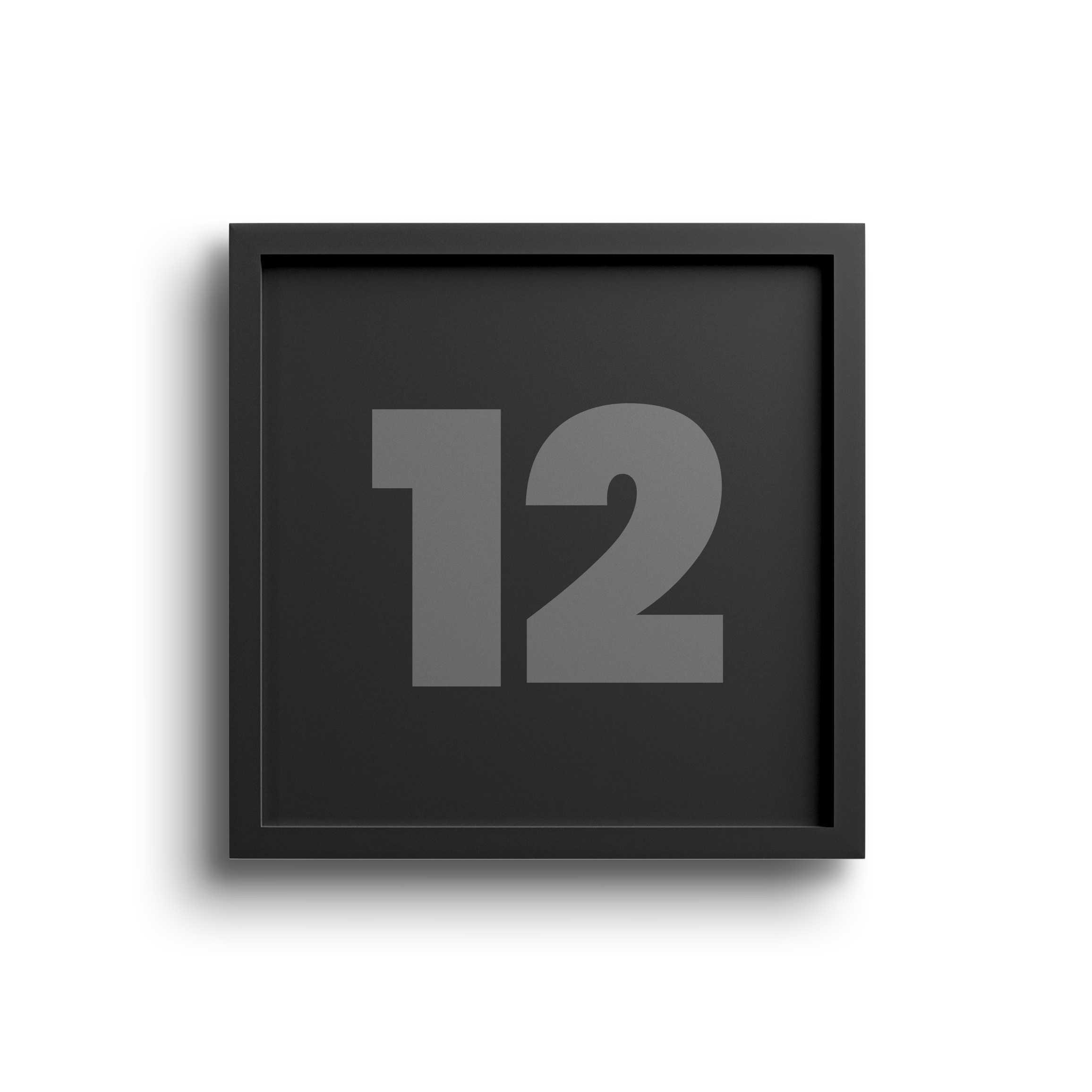 Digital black number display showing the number 12, with a beige background on the right side.