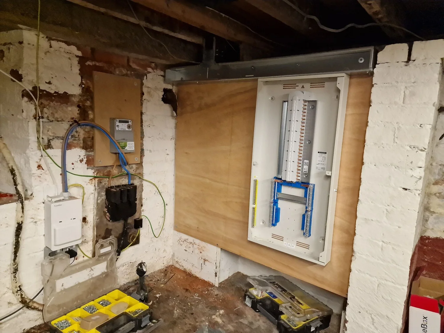 Stripped-out building with the old electrics before a Pilates studio fit-out, Leicester