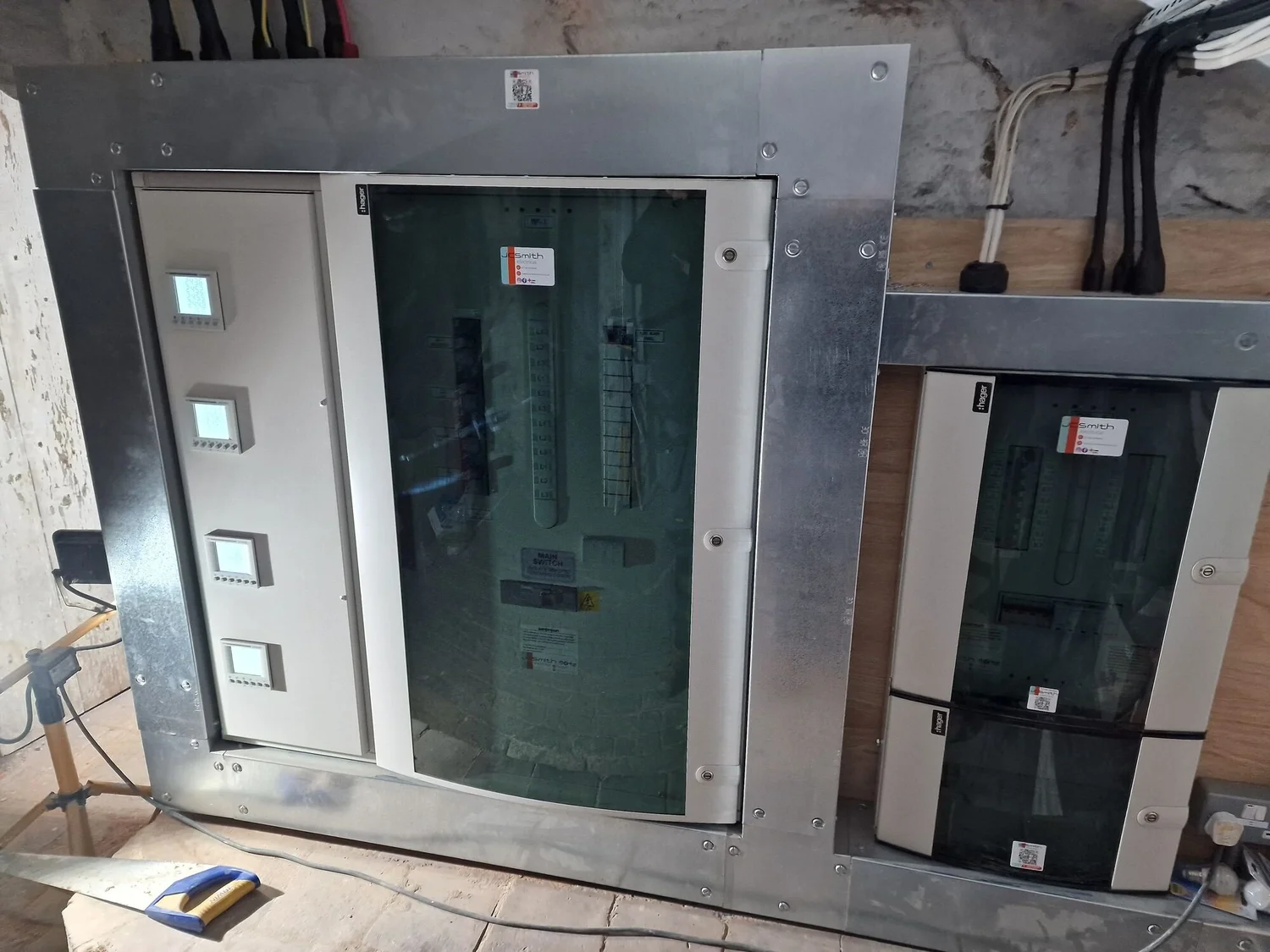 New sub-main distribution boards fitted with a galvanised steel surround and cable entry