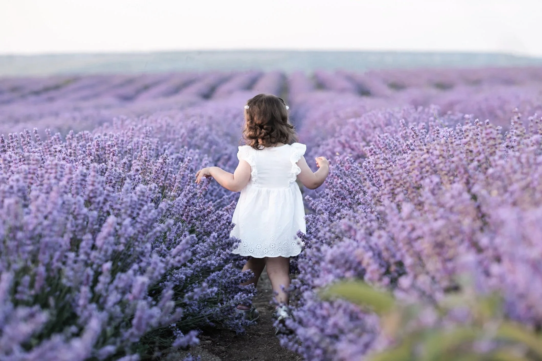 Two women hugging each other with warm expressions.