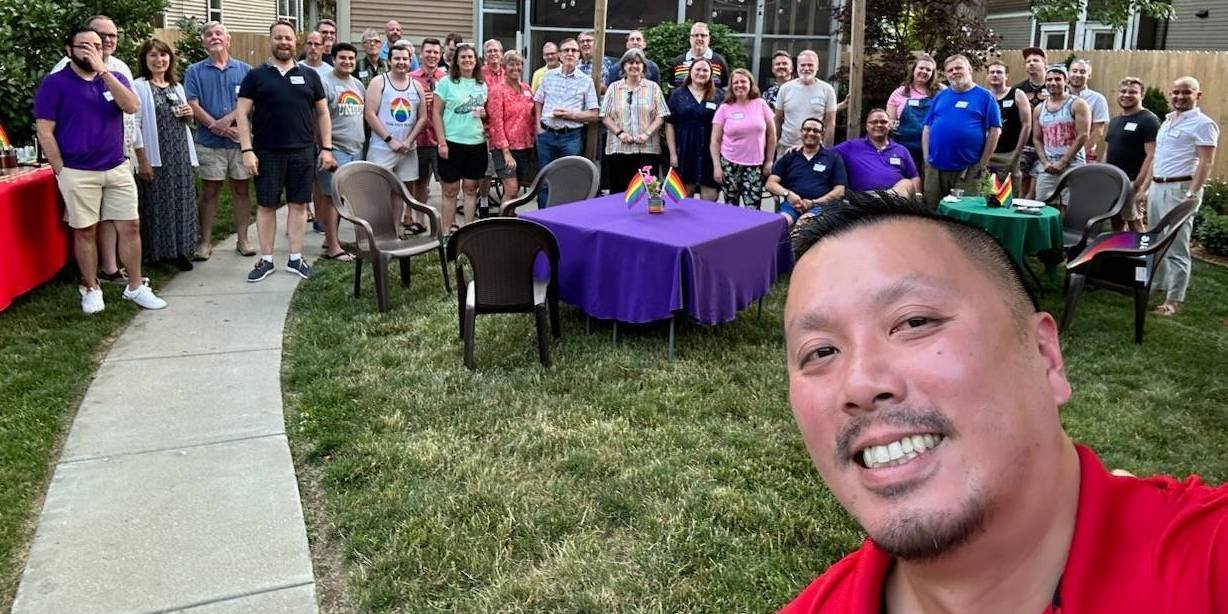 Community members enjoying a moment of laughter together at a Diversity Wine Club gathering