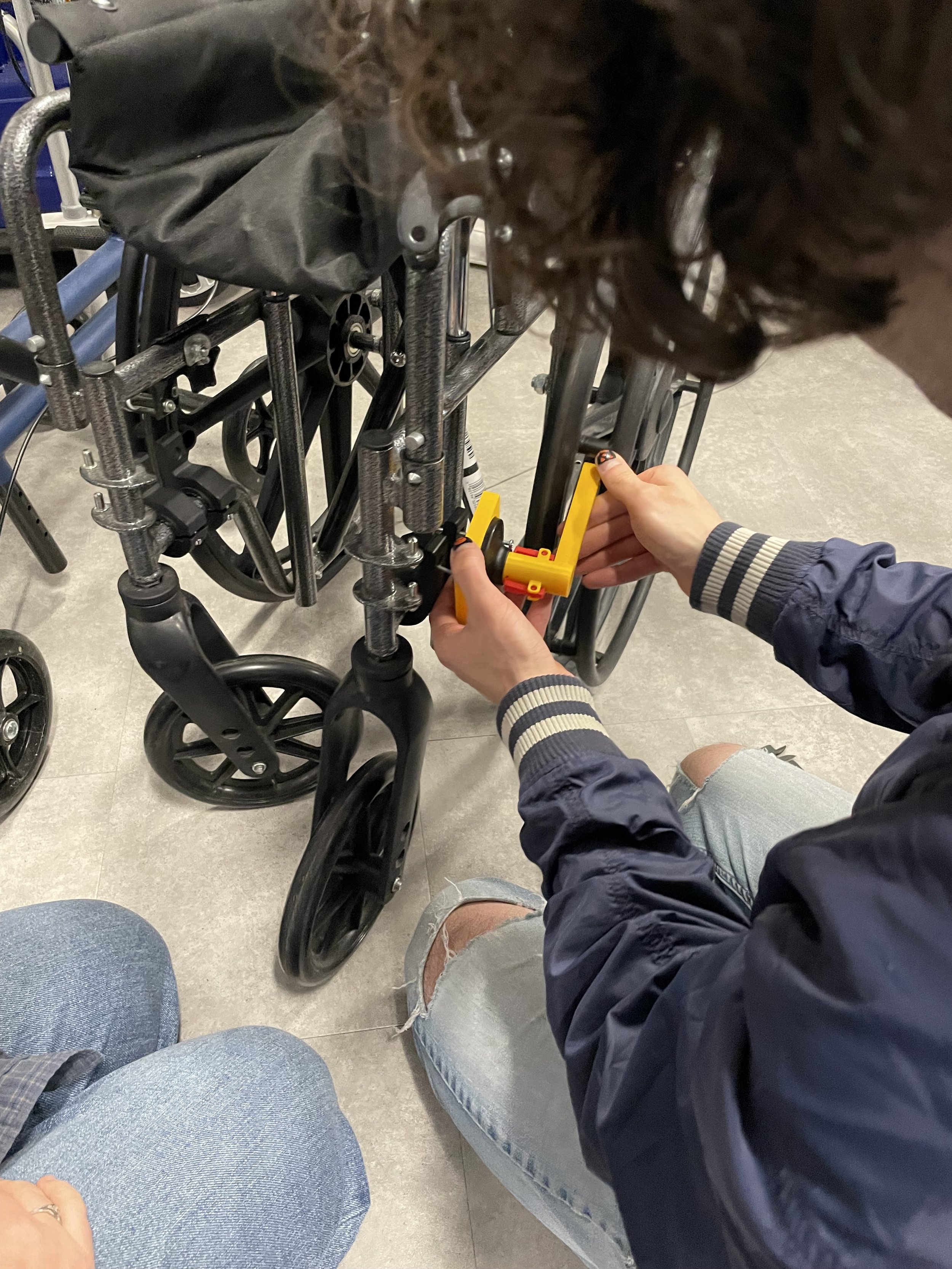 Wheelchair Back-Pedal Lock 1.JPG