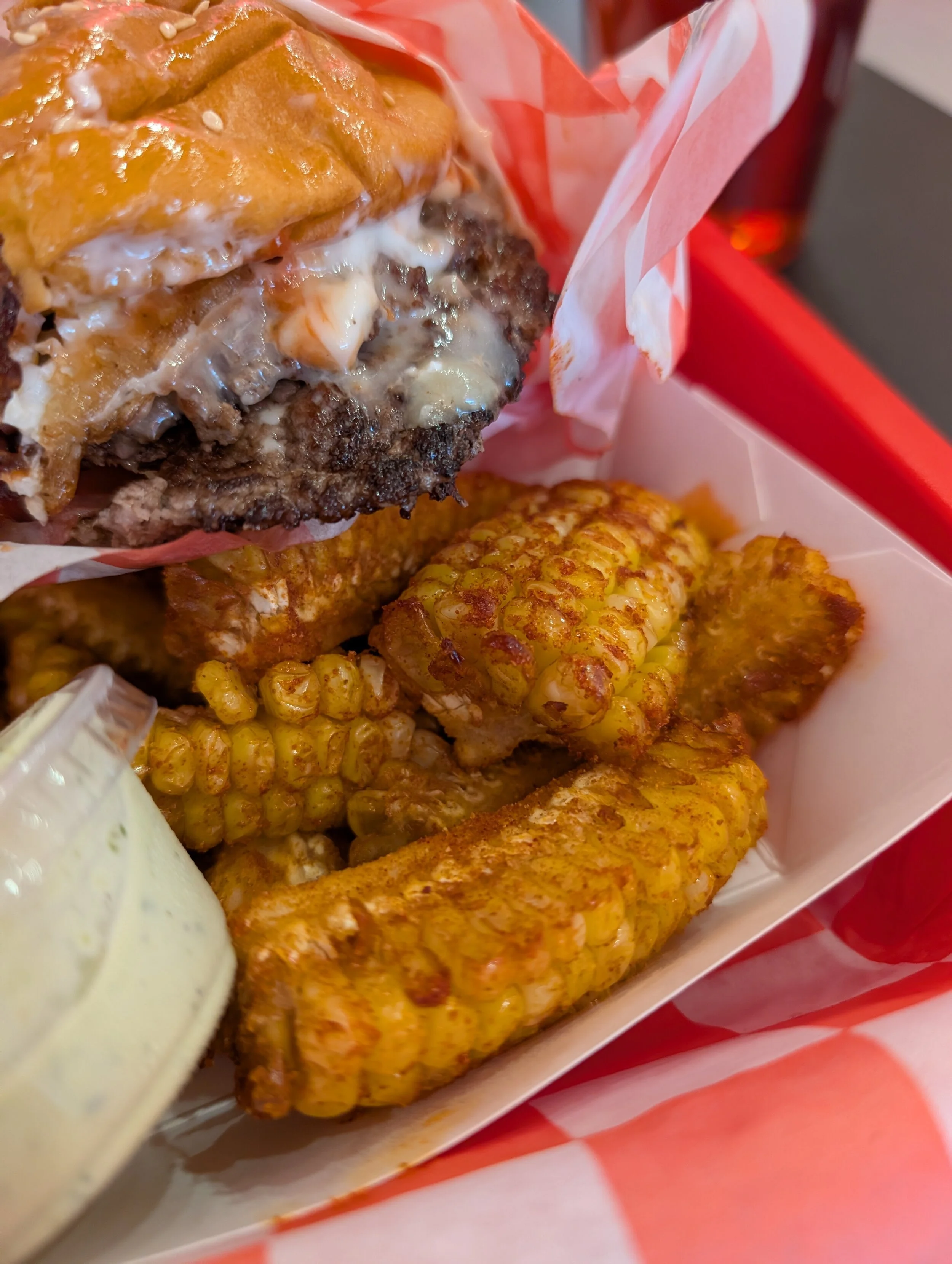 Grub on a smash burger at No Idea Burger