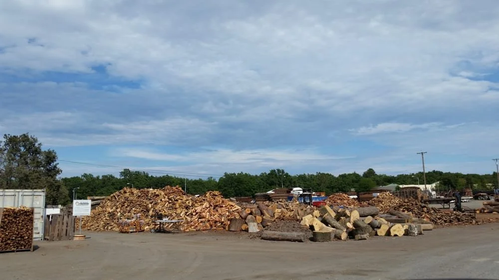 Customer picking up wood for their Cotate fireplace