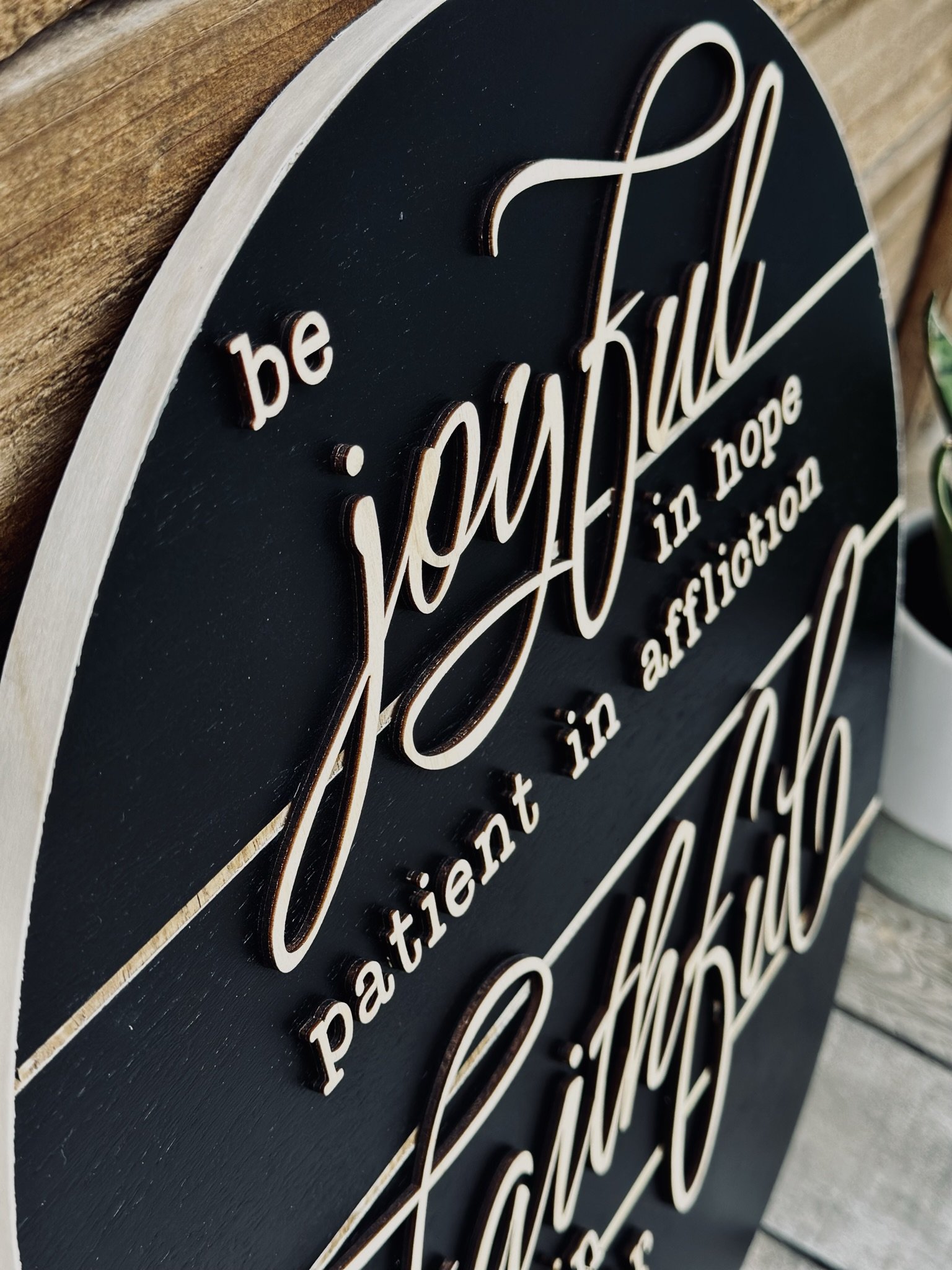 Be joyful in hope round side view.jpeg