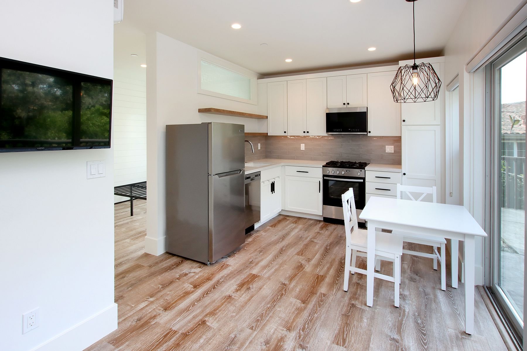 Full kitchen and dining area in ADU