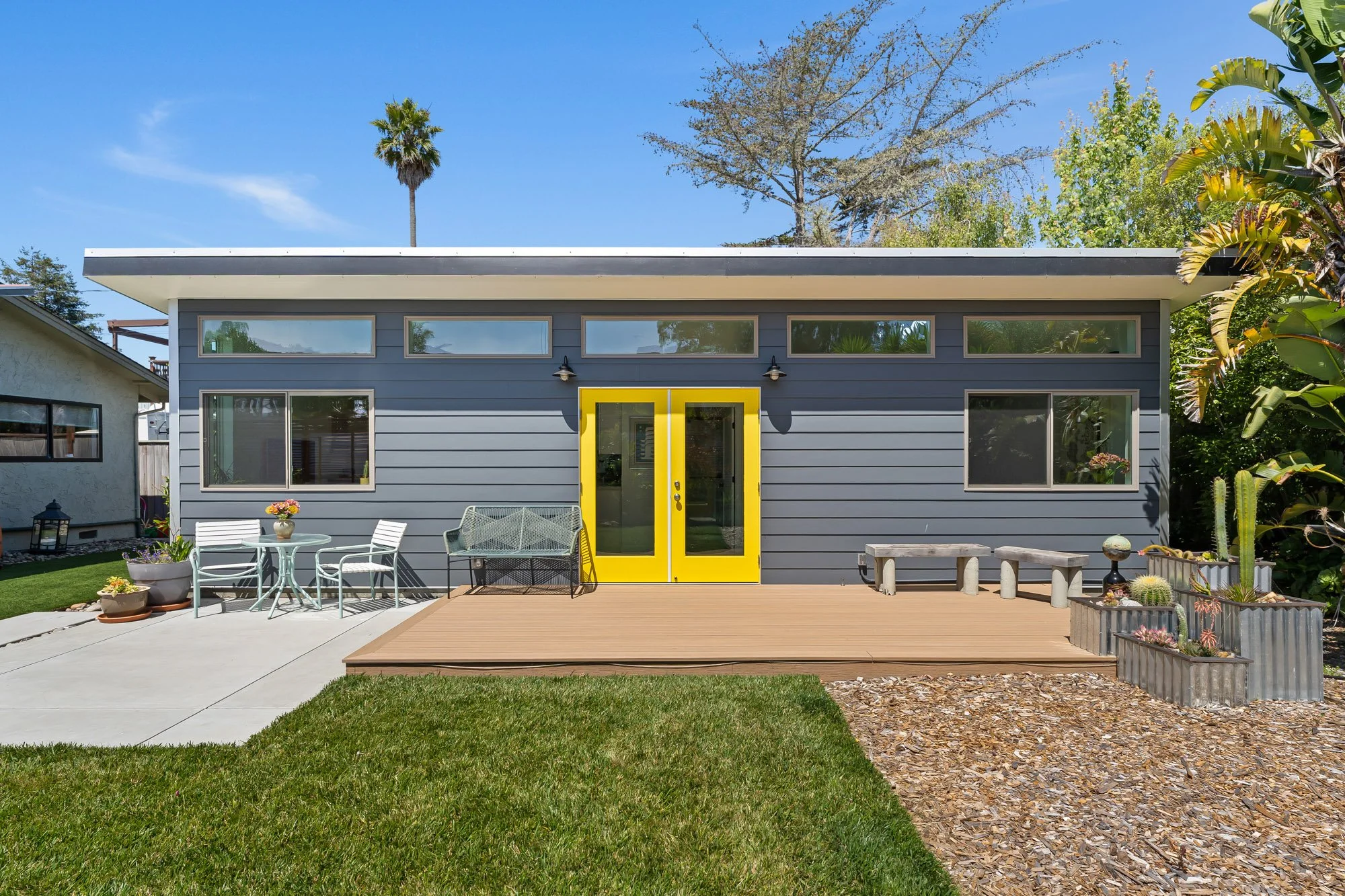 This detached ADU was designed to provide flexible living space while complementing the existing home and backyard.