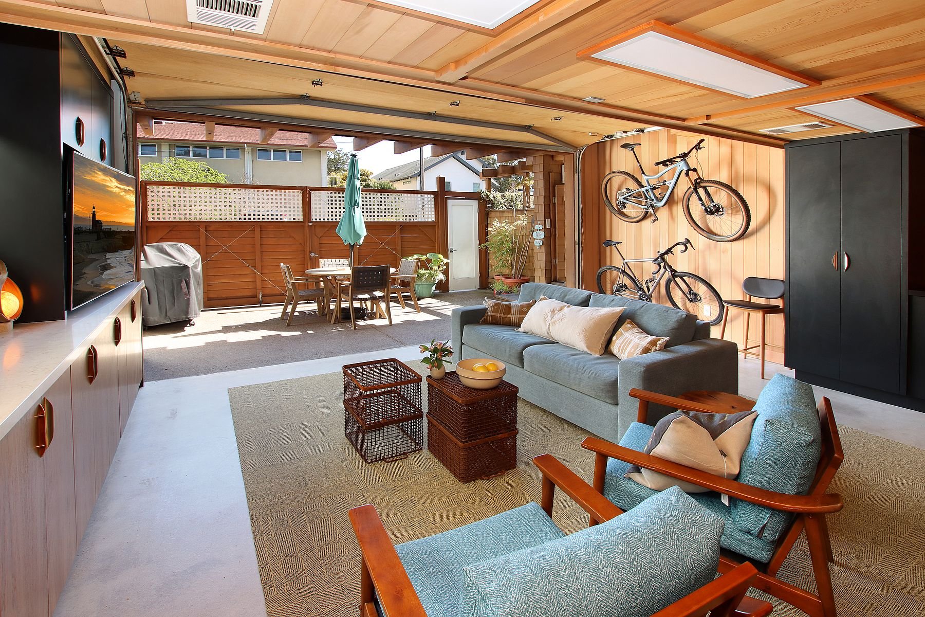 Converted garage becomes an entertainment room with full bar area