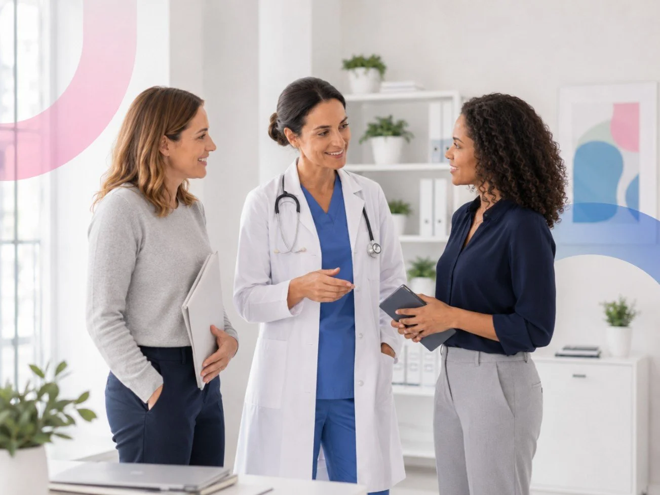 Three women, including a doctor with a stethoscope, engaging in conversation in a medical office.