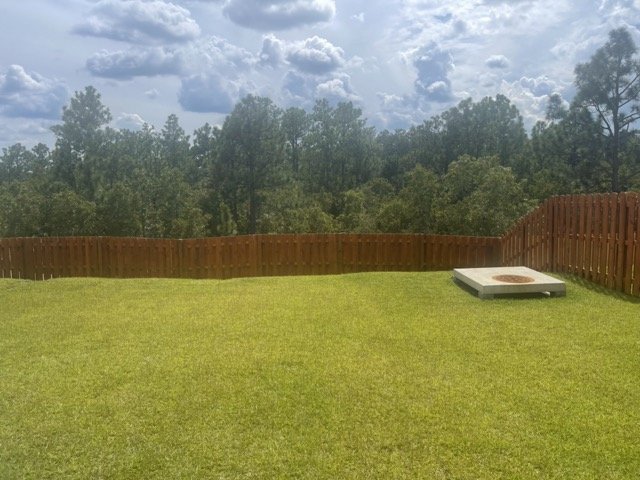 Semi transparent redwood fence staining