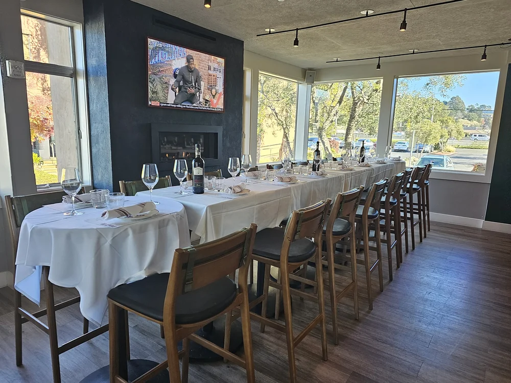 Cocktail Area with fireplace set for a group event at Piatti Mill Valley