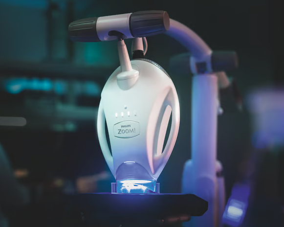 Close-up of a zoom light medical device used for eye examinations in a clinical setting.