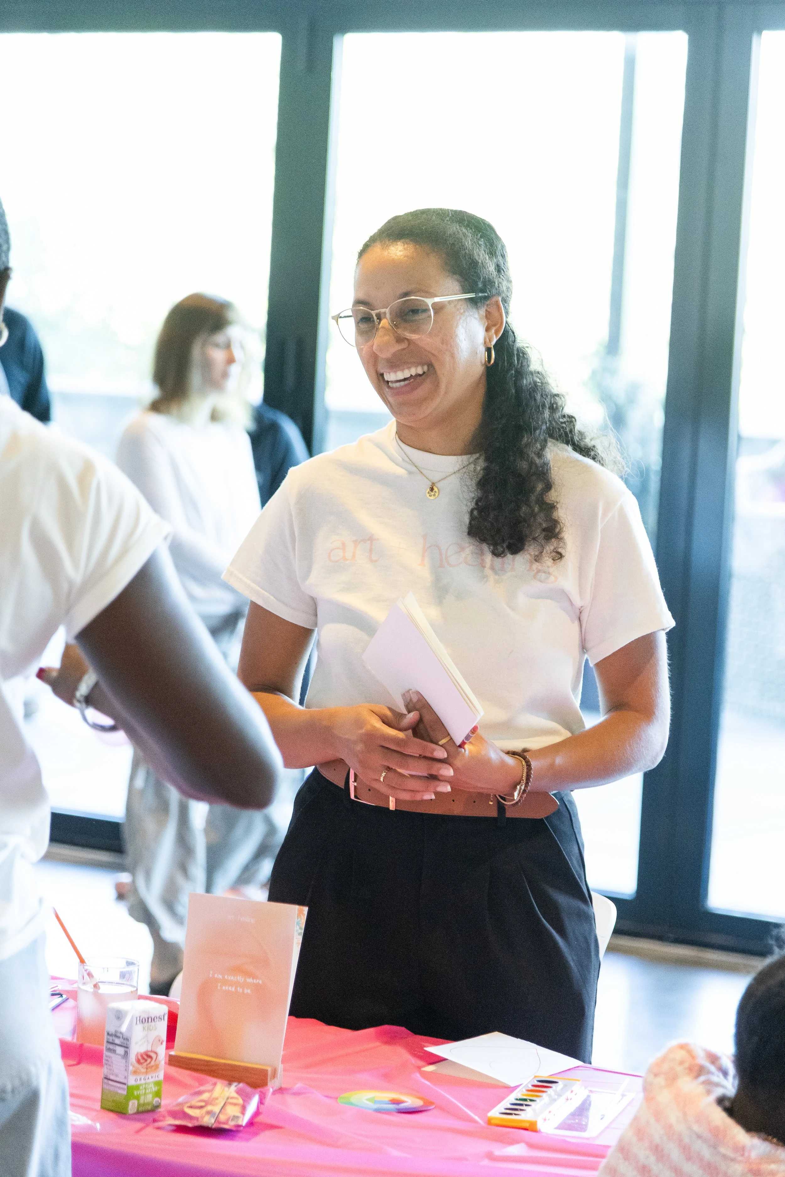 Zebrina Lee of Art + Healing running the art table at Young at Heart community playdate at Hyde House