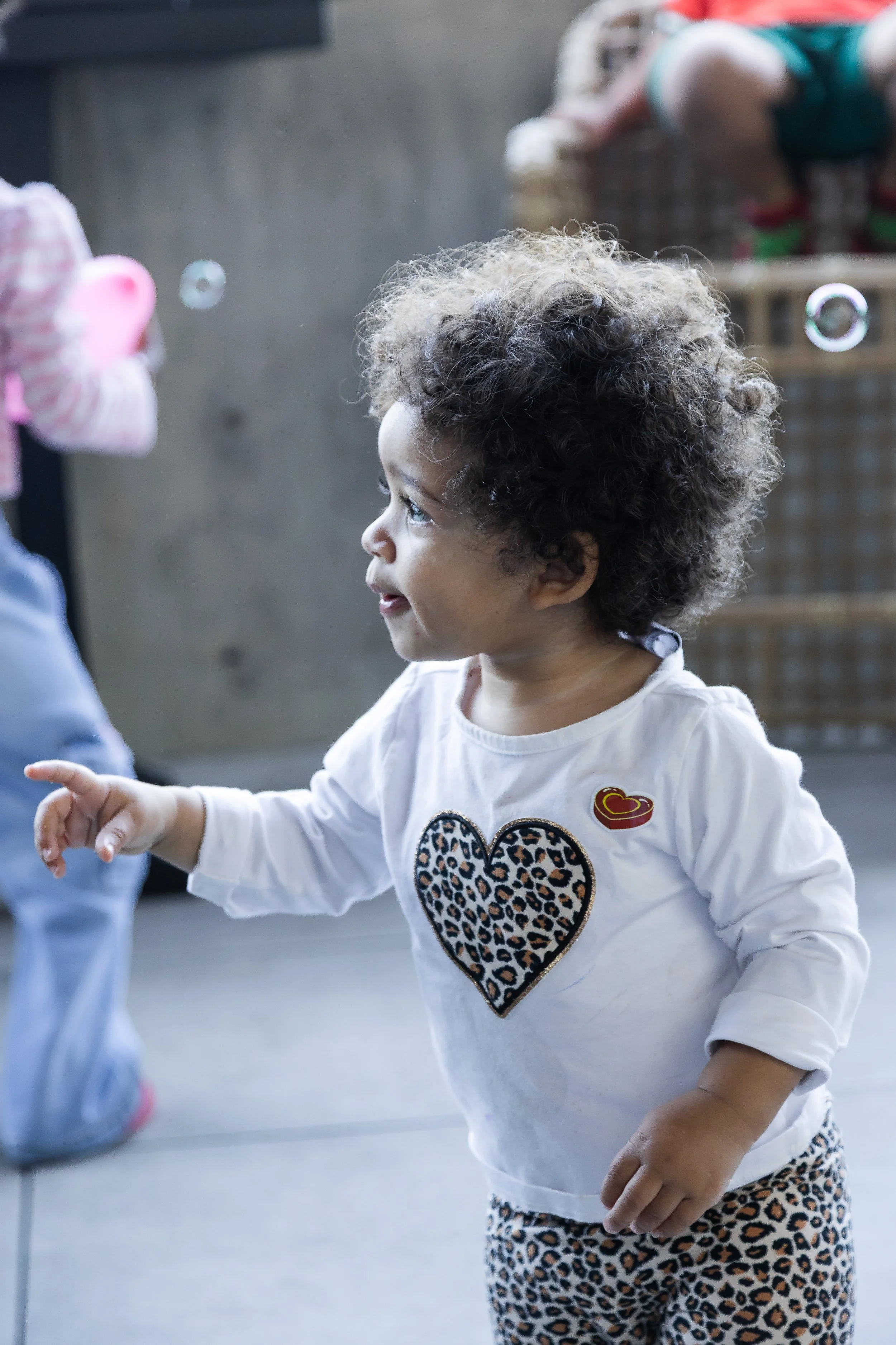 Kids playing with bubbles at Young at Heart playdate