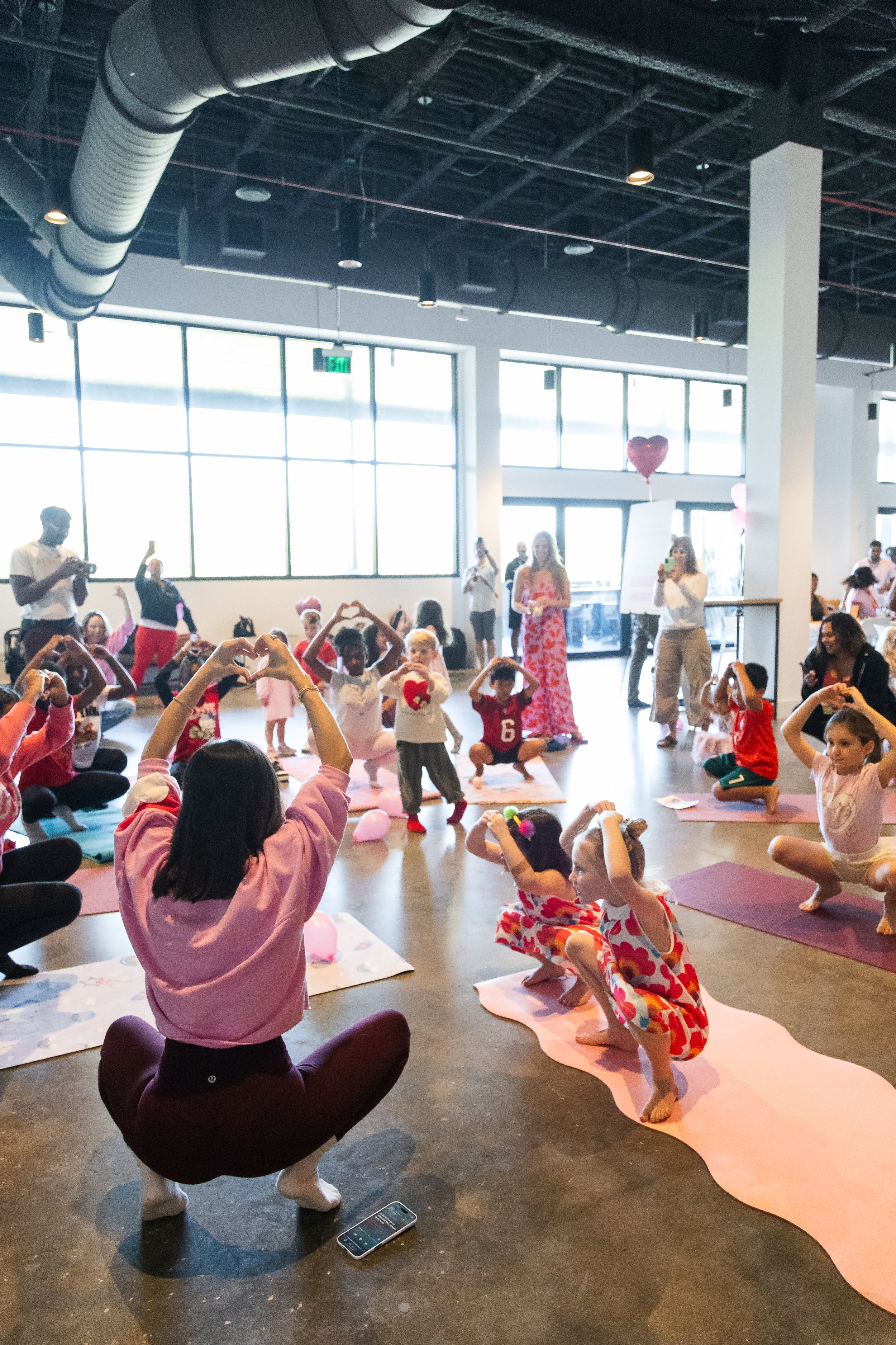 Group circle moment during kids mindfulness activity in Tampa.