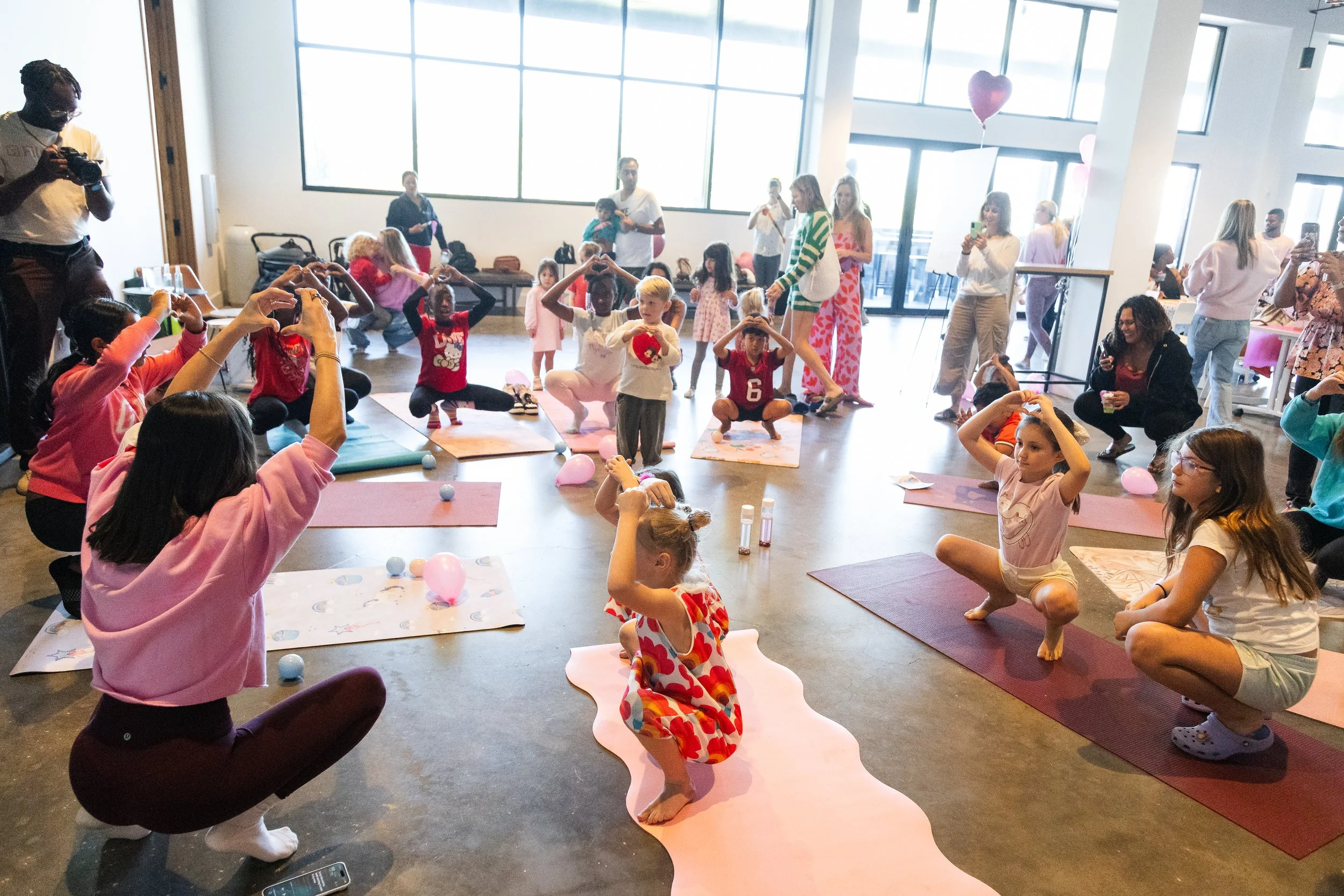 Kids yoga game at Young at Heart Valentine’s Day Playdate at Hyde House in Tampa