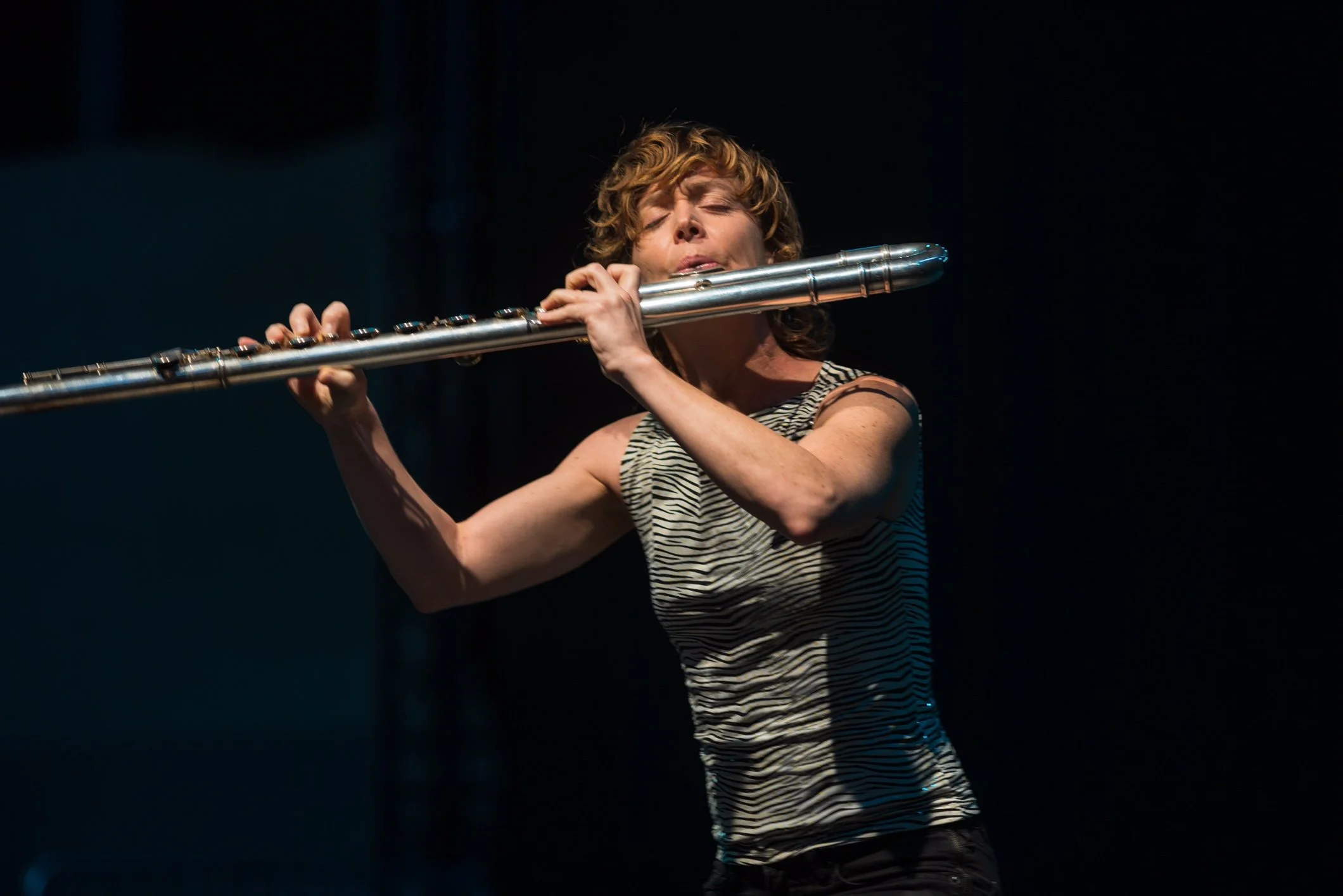 Claire Chase in performance at Darmstadt. Photo: Kristof Lemp.