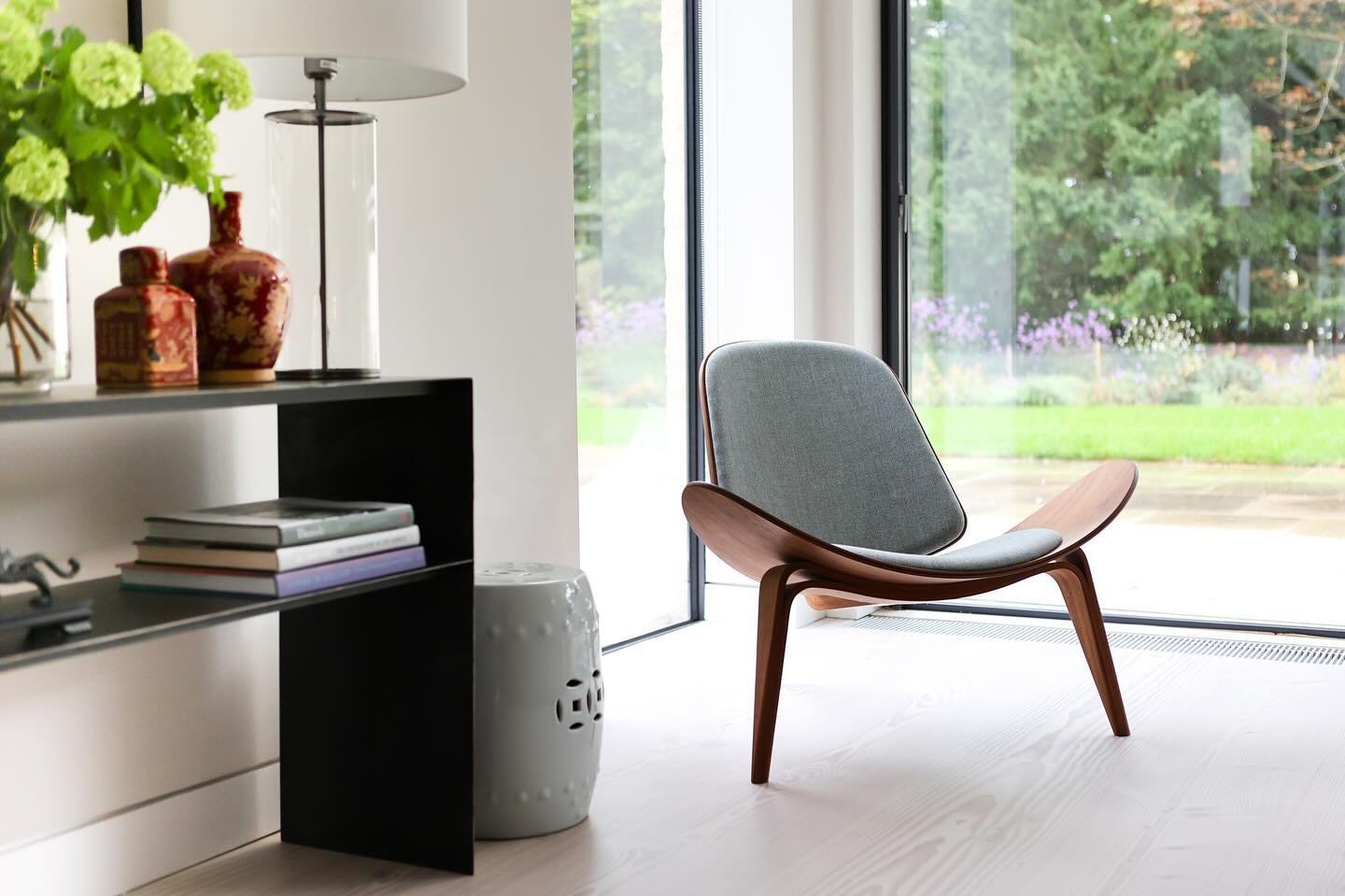 Accent chairs ~ adding an accent chair to a room will enhance and elevate the design.  It can be an iconic piece like this CH07 Shell Chair by Hans J. Wegner or it can be a vintage piece or a favourite chair upholstered in a beautiful fabric in a con