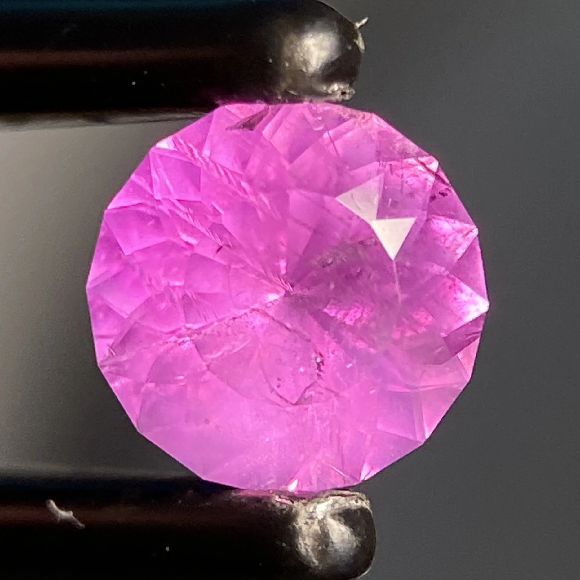 0.75 ct electric pink Tanzanian sapphire