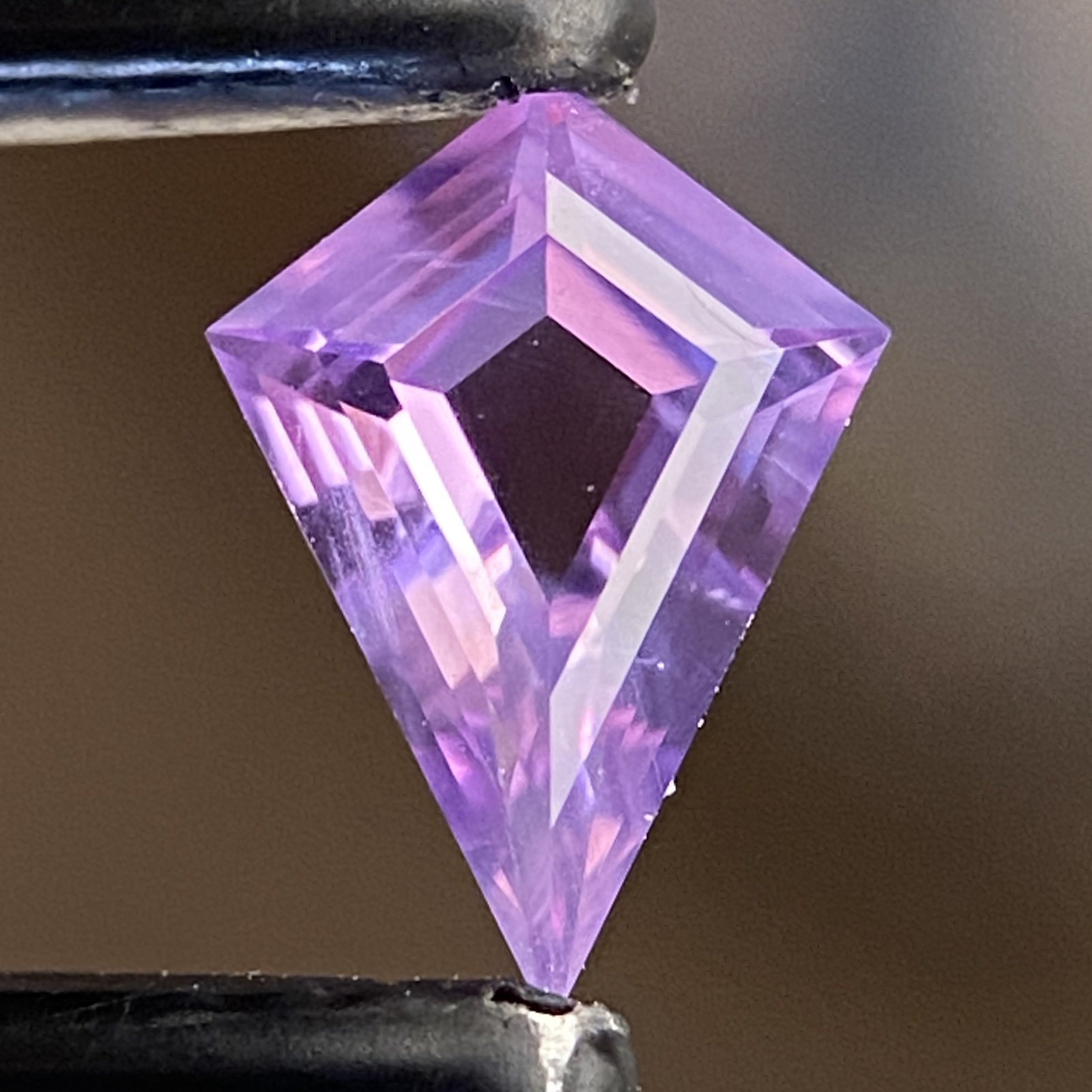 0.65 ct lilac purple Sri Lankan sapphire