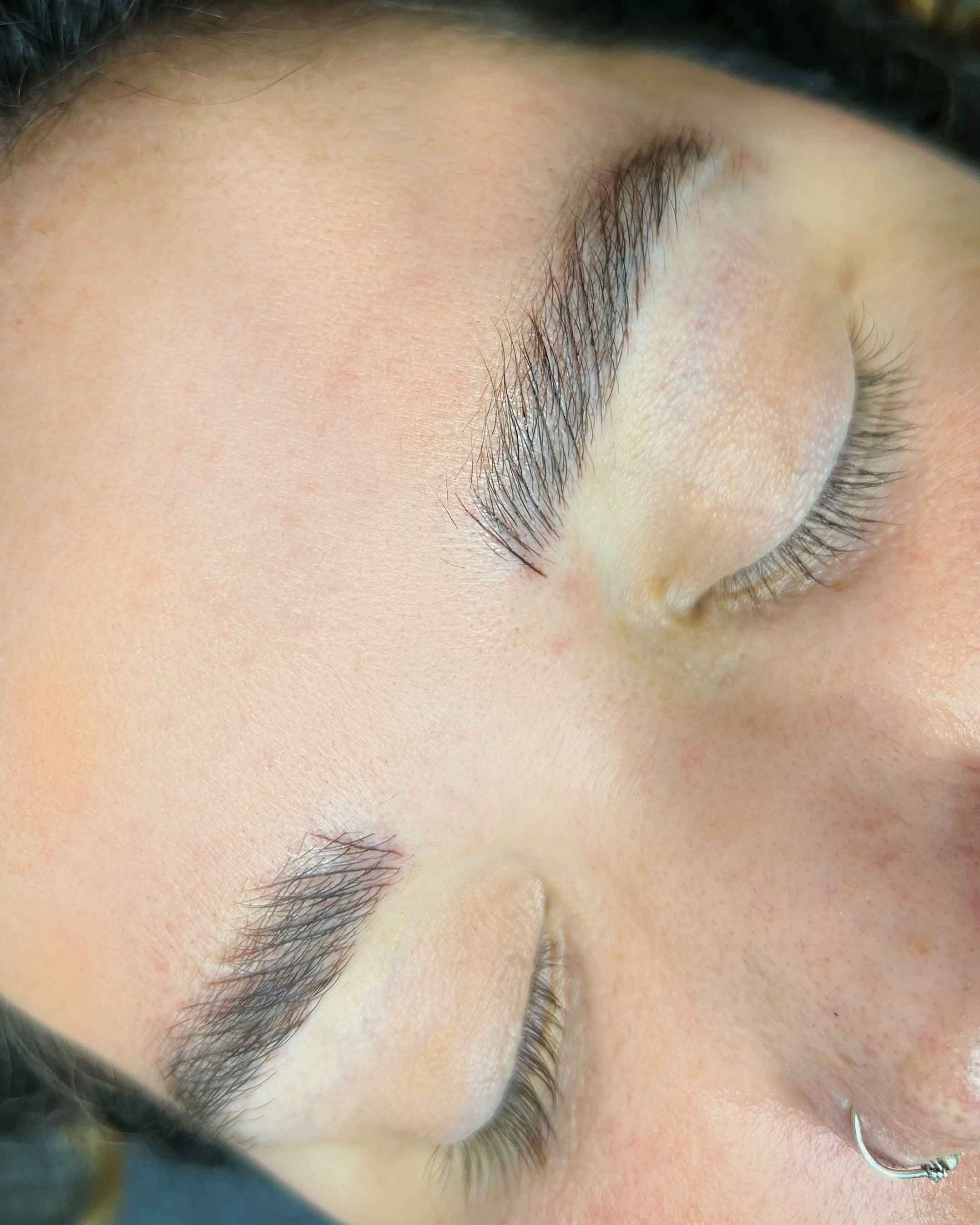Close-up of full, natural, fluffy brows after microblading with Lash Girl London