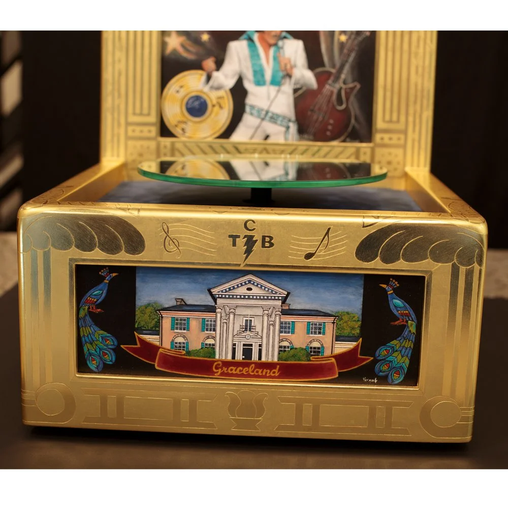 The front lower panel features the iconic Graceland estate.  All the panels were commissioned expressly for this project and were acrylic on panels.