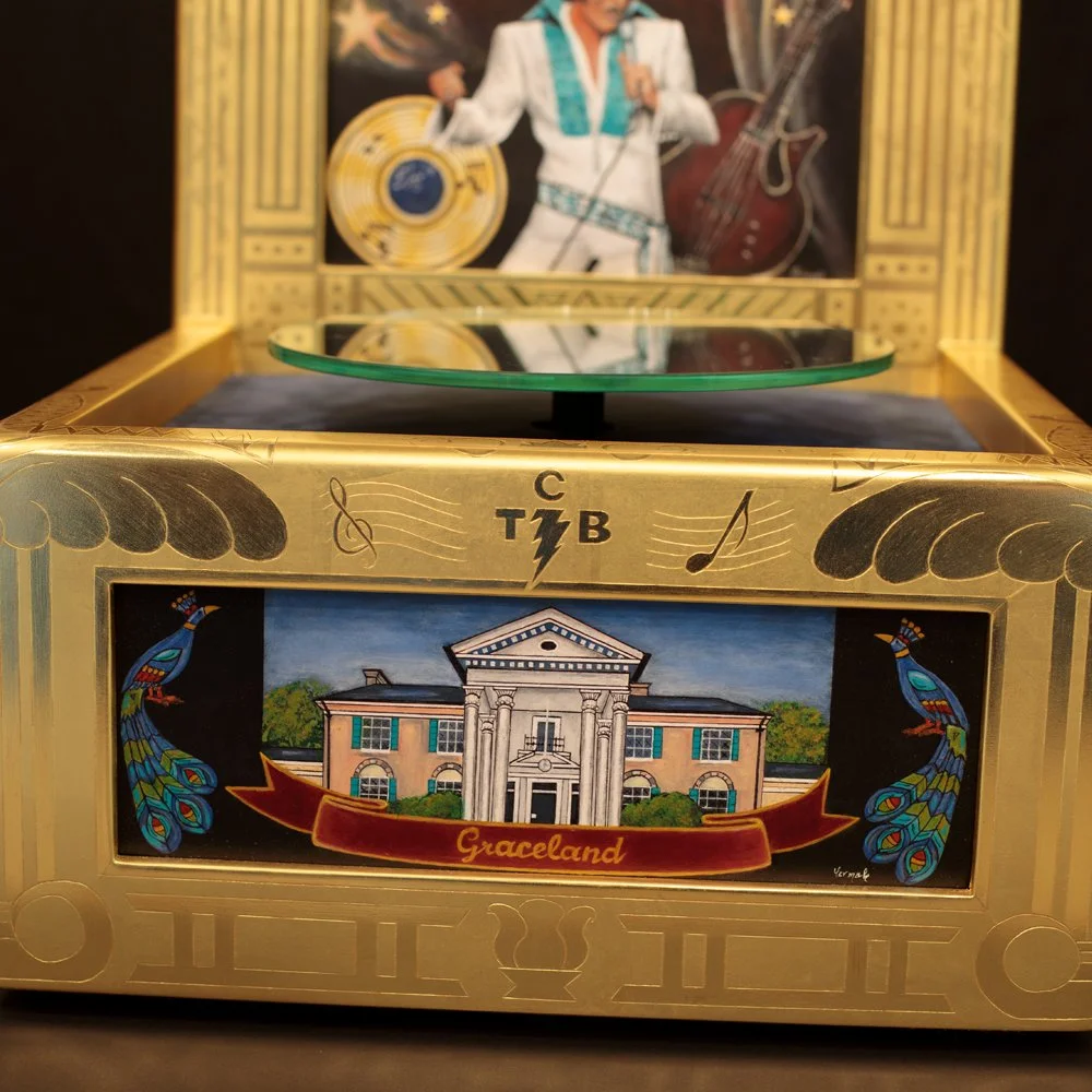 This close up view of the Graceland panel clearly shows Elvis' tagline, "TCB" (Taking Care of Business).