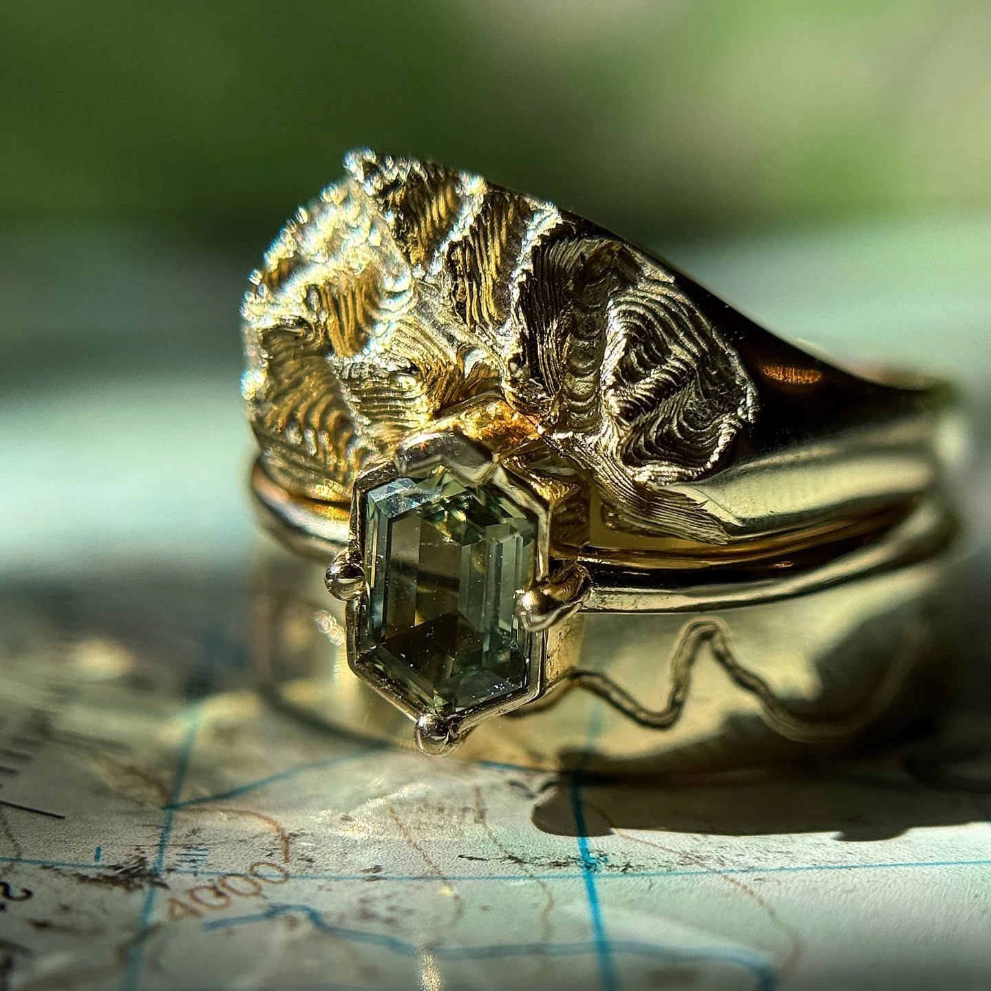 New Custom Topographic Wedding Set ✨

This one of a kind topo set brings together three distinct styles, all rooted in one unforgettable place&hellip;Douglas Island, AK🏔️

The trail band is hand-engraved with the couple&rsquo;s favorite hike that wi