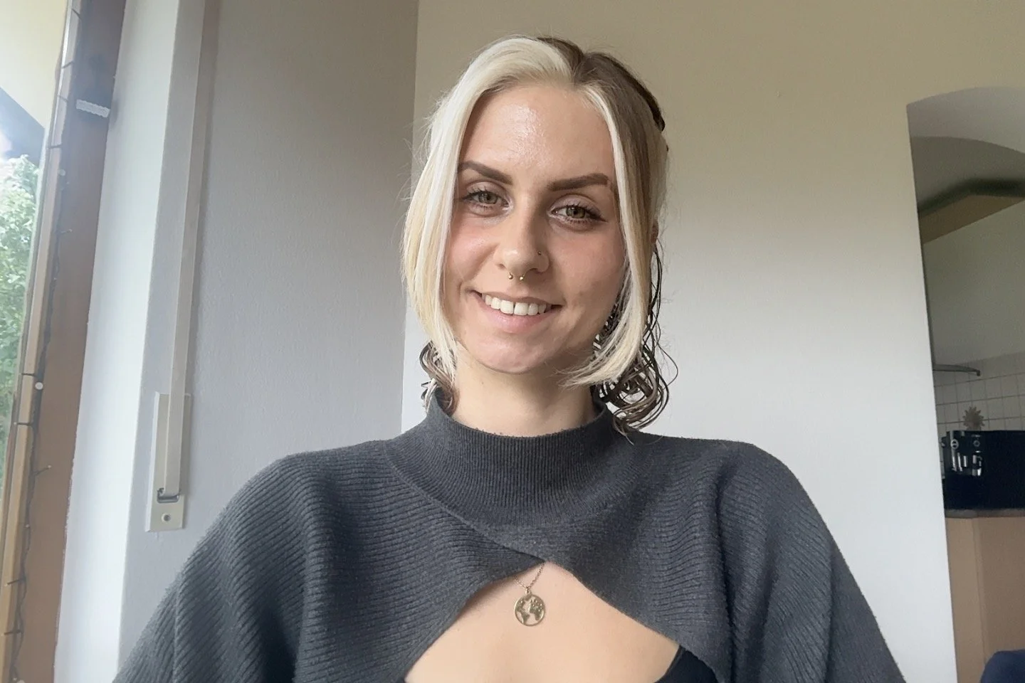 Erinna smiling into the camera