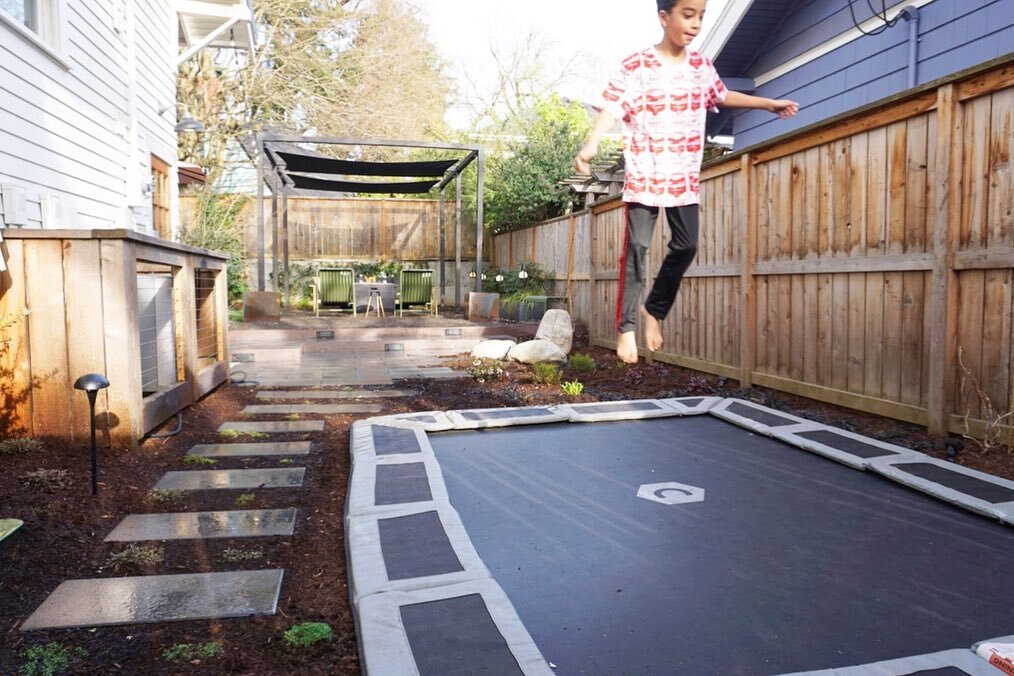 J U M P //
For joy on this @capital.play in ground trampoline. Under this trampoline is some serious drainage. Because we didn&rsquo;t have room in the landscape for a rain garden we piped the homes downspouts into 4 Flowells under this trampoline. A