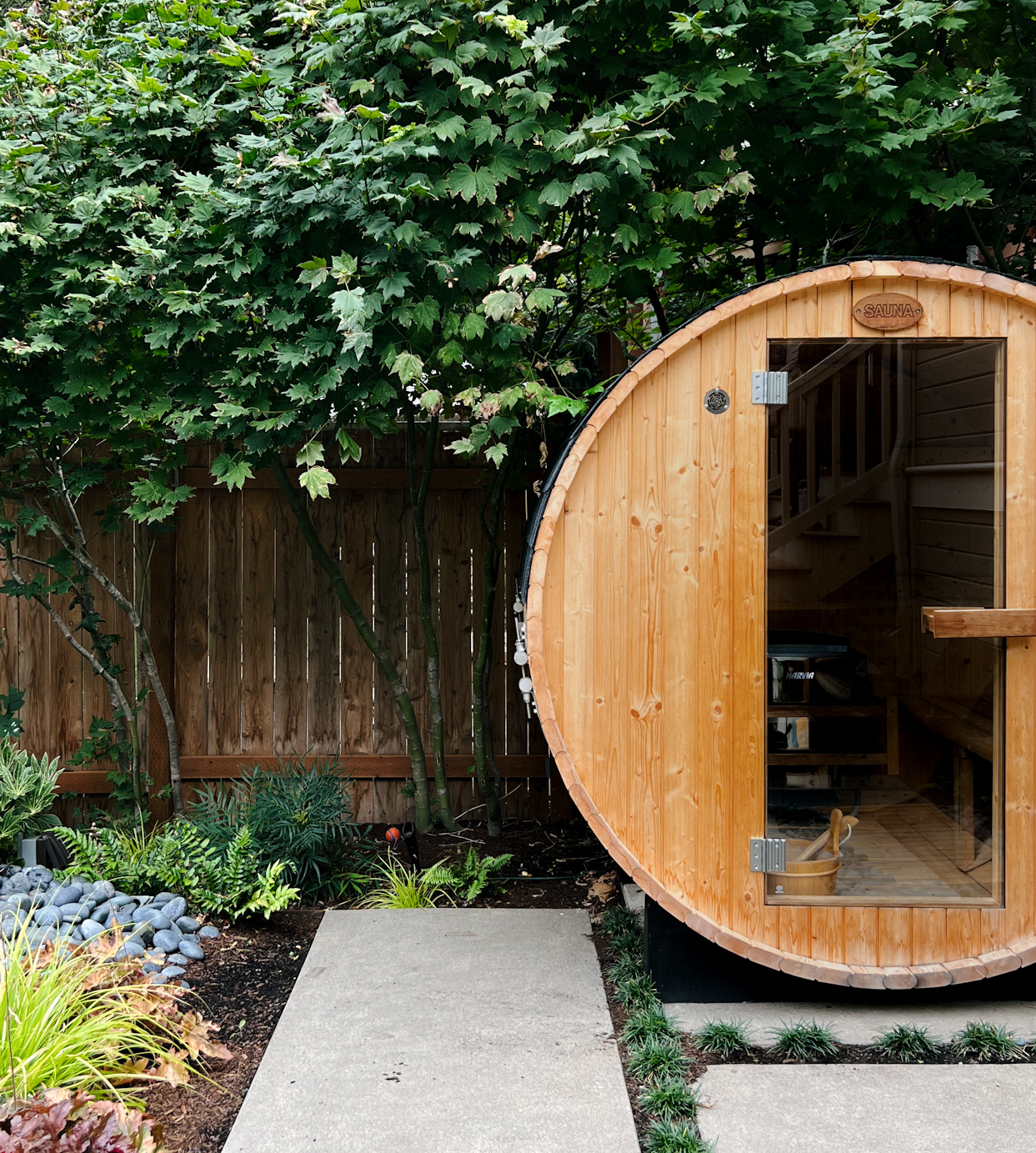 Cedar sauna in a professionally designed backyard wellness zone, Portland Oregon