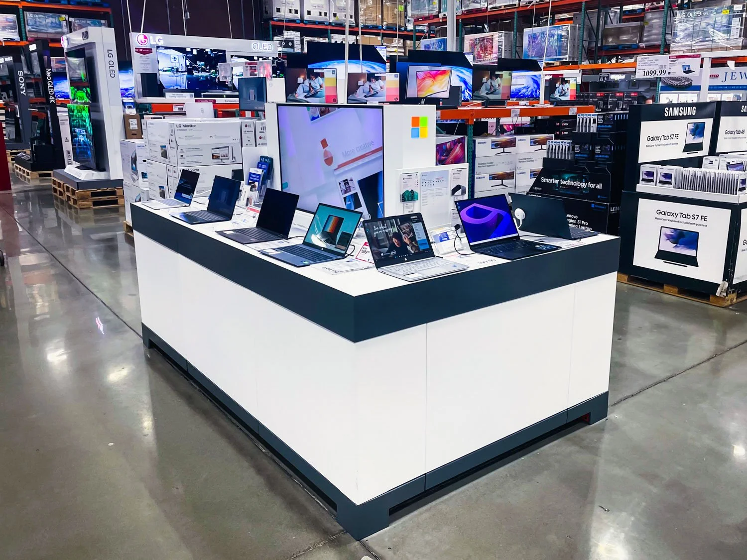 costco-device-tables-retail-laptop-display.jpg