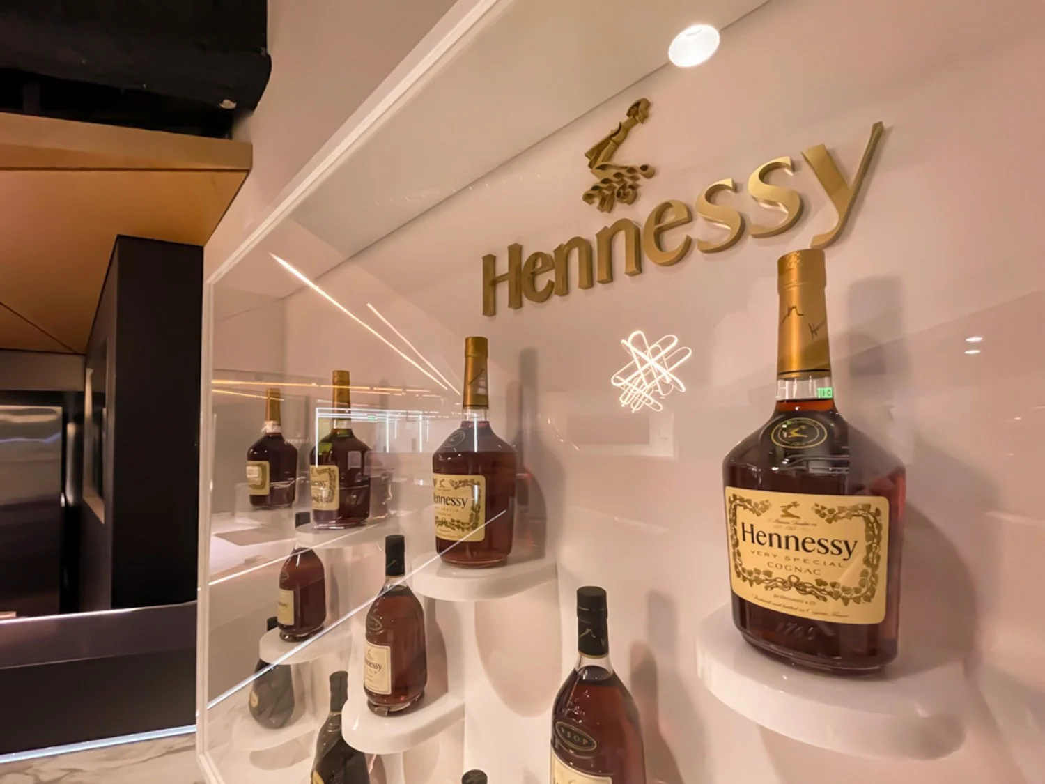 hennessy-bar-at-climate-pledge-cognac-bottle-display.jpg