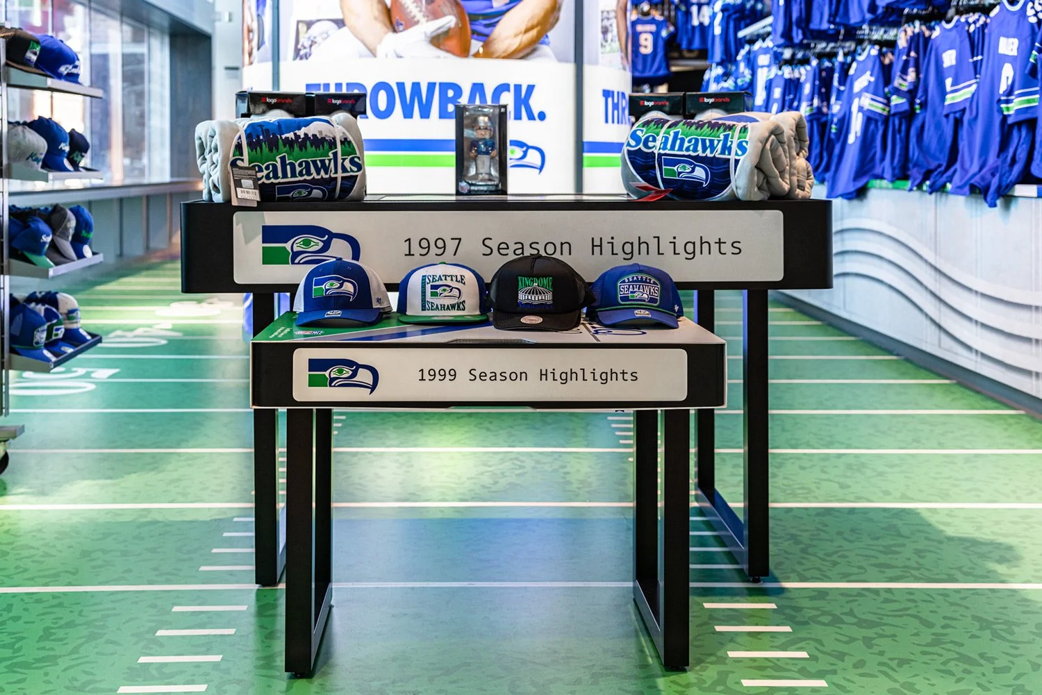 seahawks-throwback-experience-retail-merch-tables.jpg