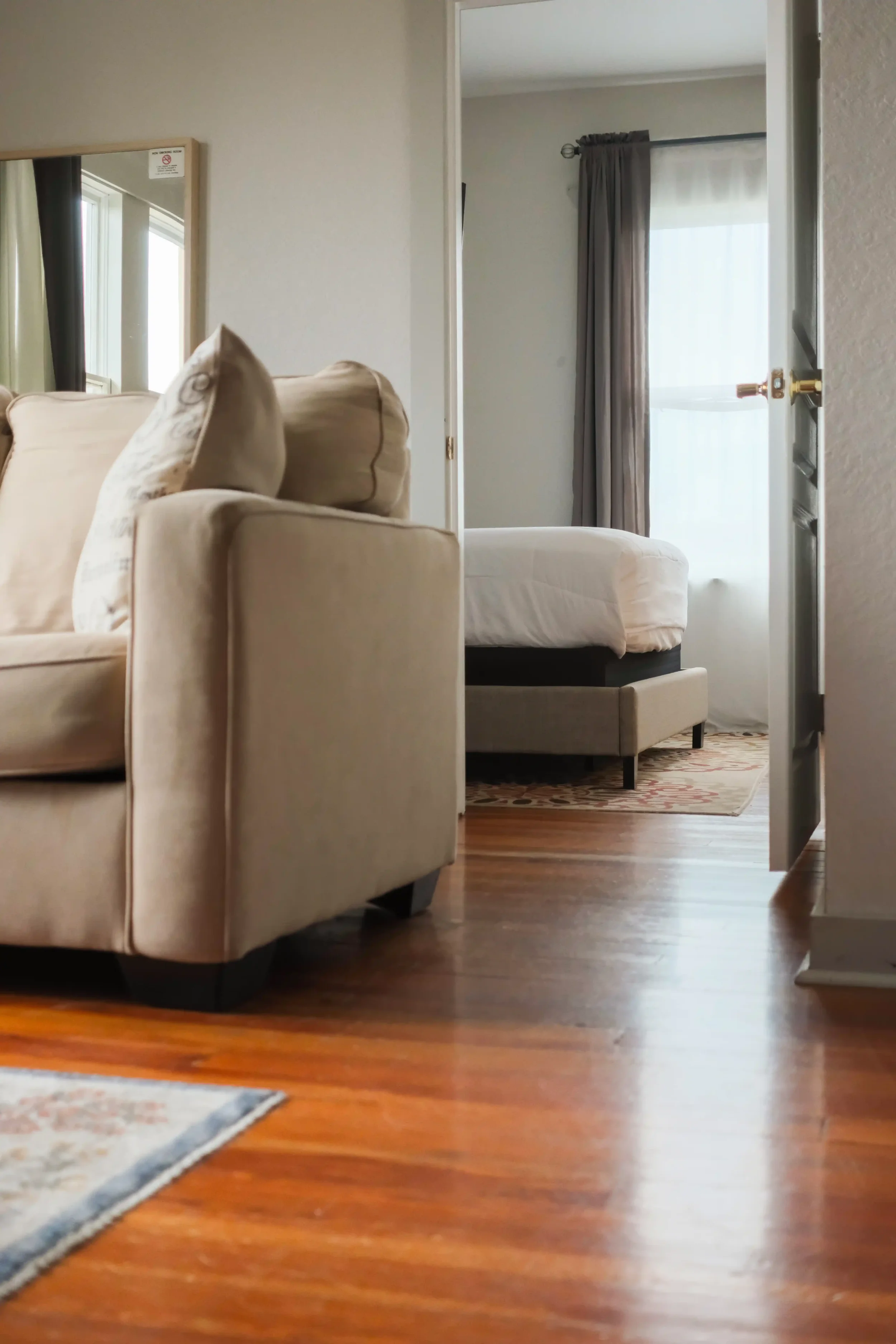 The suite layouts feature warm hardwood floors and distinct living areas that provide a highly curated residential feel. 