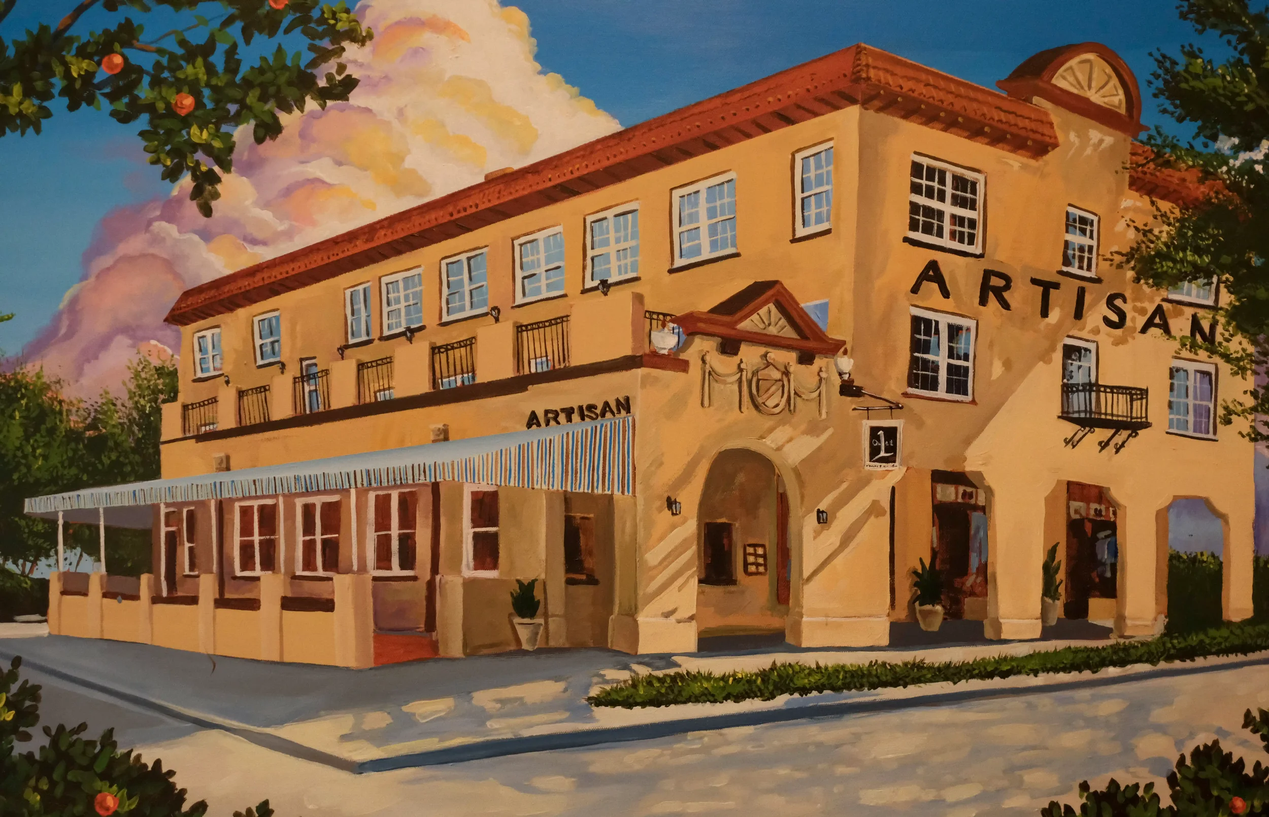 A colorful painting of The Artisan Downtown building corner, highlighting its pale yellow exterior, striped awnings, and arched entranceway.