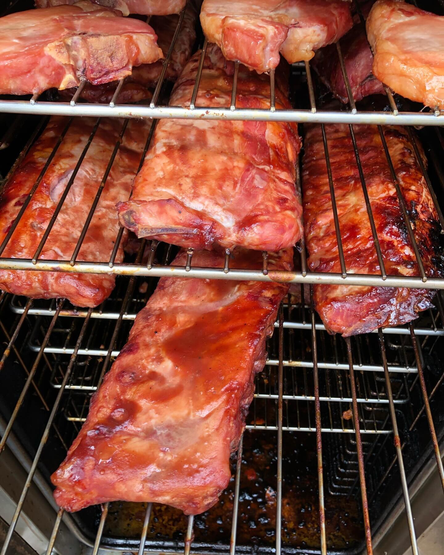 Drooling yet?🤤 It&rsquo;s Saturday y&rsquo;all and you know what that means . . . the smoker is workin&rsquo; over time! We&rsquo;ve got smoked baby backs, chicken wings, and pork chops ready to make your weekend that much better! As usual - while s