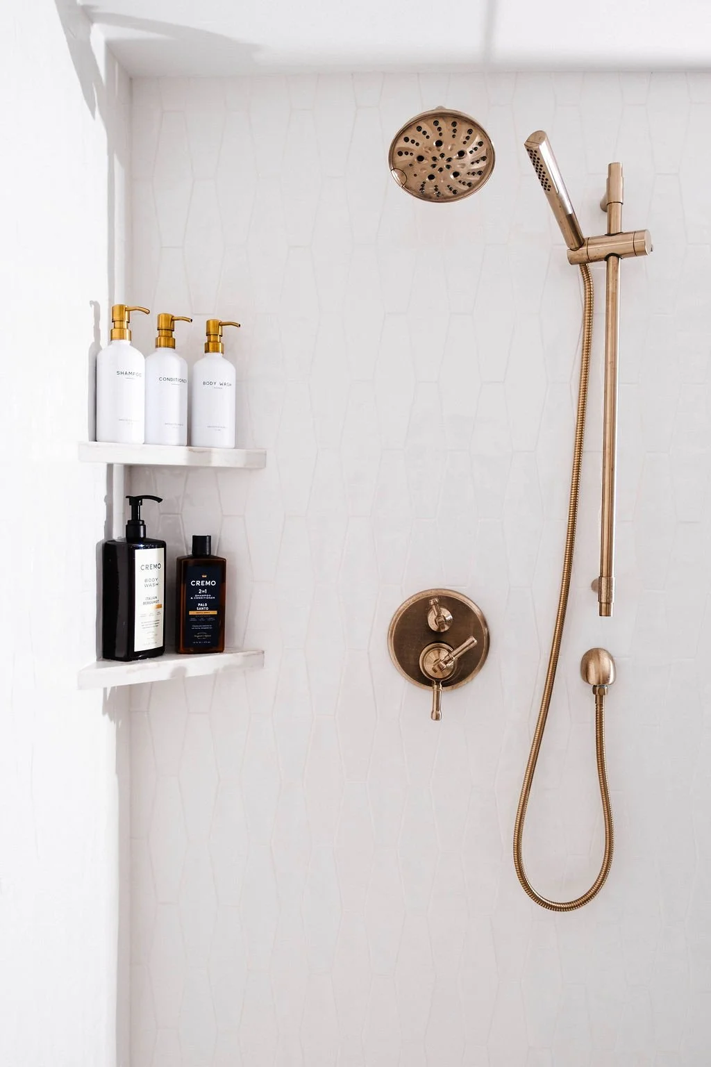 white-shower-brass-plumbing.jpg