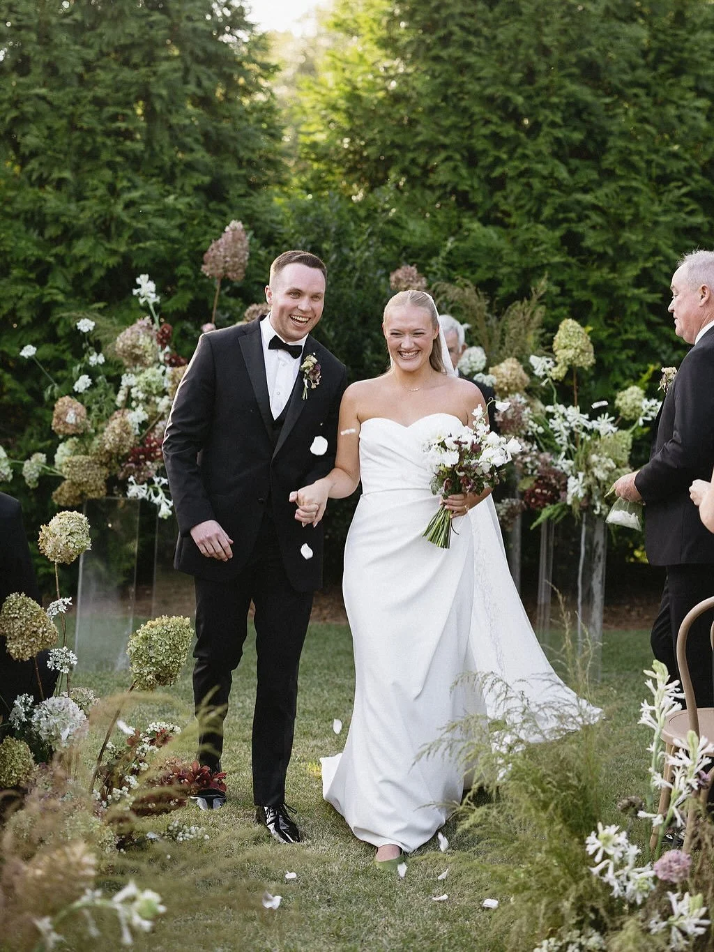 Petals flying, hearts full ✨

Haylee &amp; Will are officially Mr. &amp; Mrs. and we couldn&rsquo;t be more over the moon for them 🤍 As an interior designer, Haylee brought such a thoughtful, intentional eye to every decision - yet trusted us comple