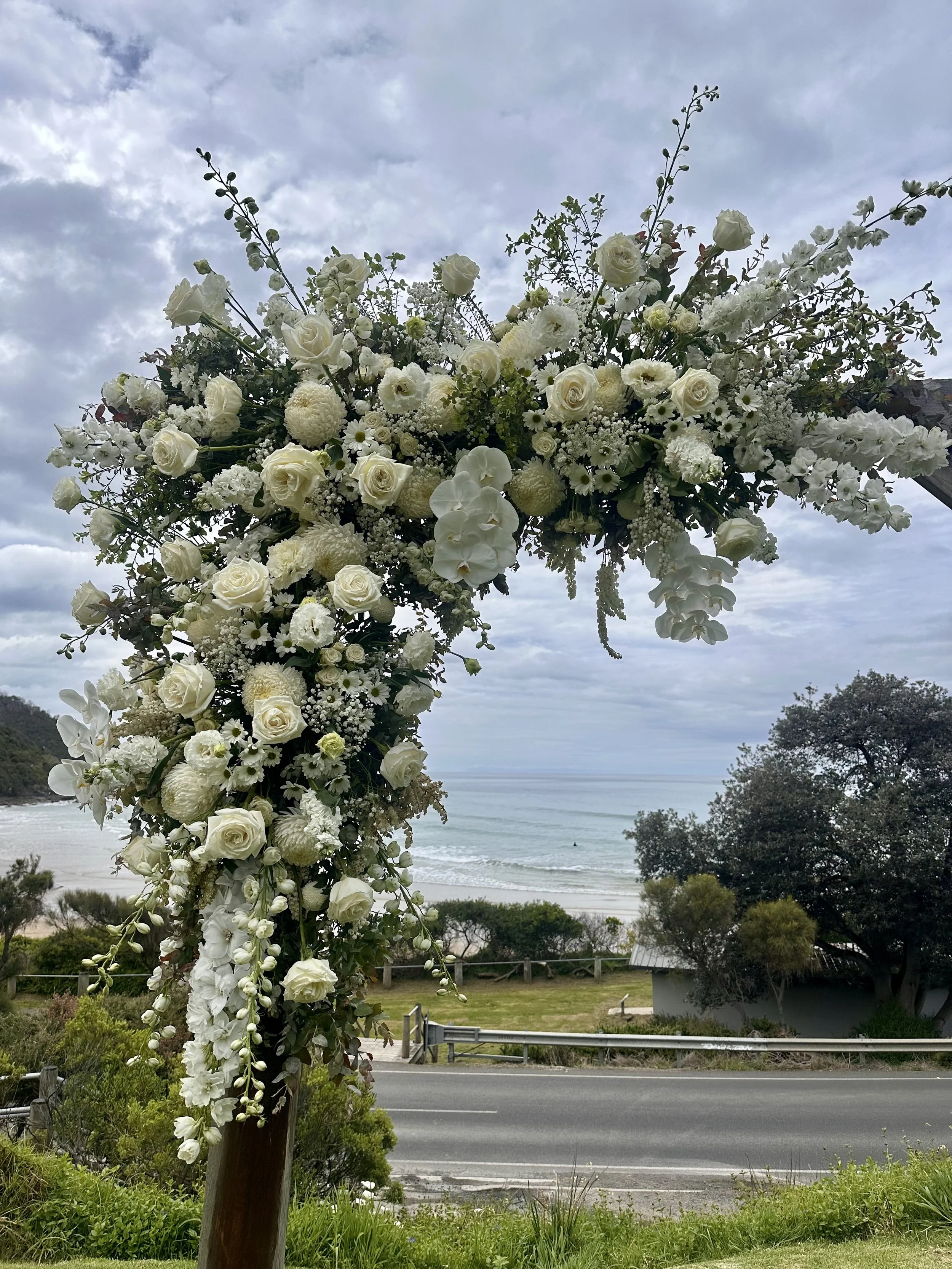 White Wedding Arbor Florals