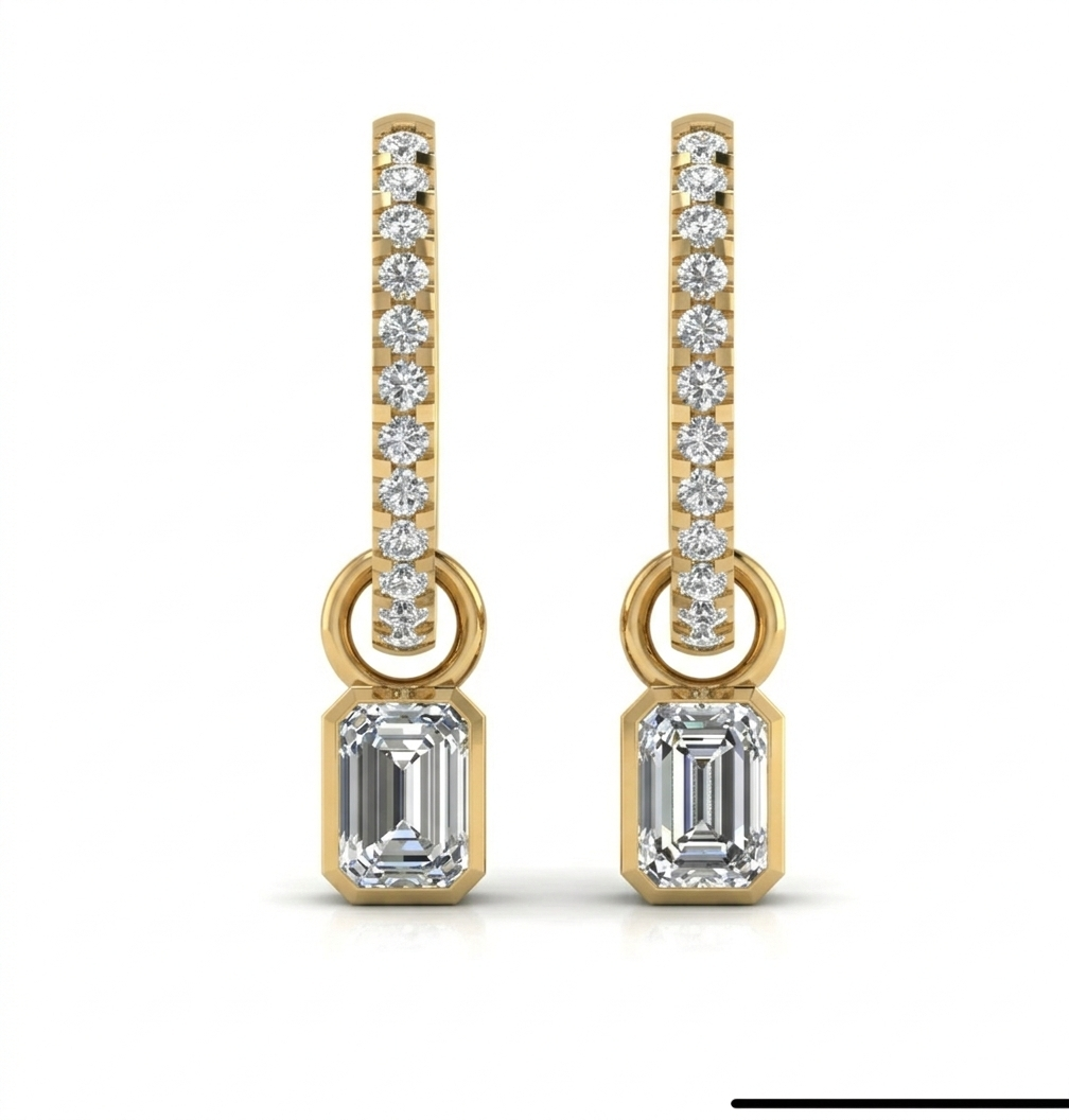 Pave hoops with dangling emeralds